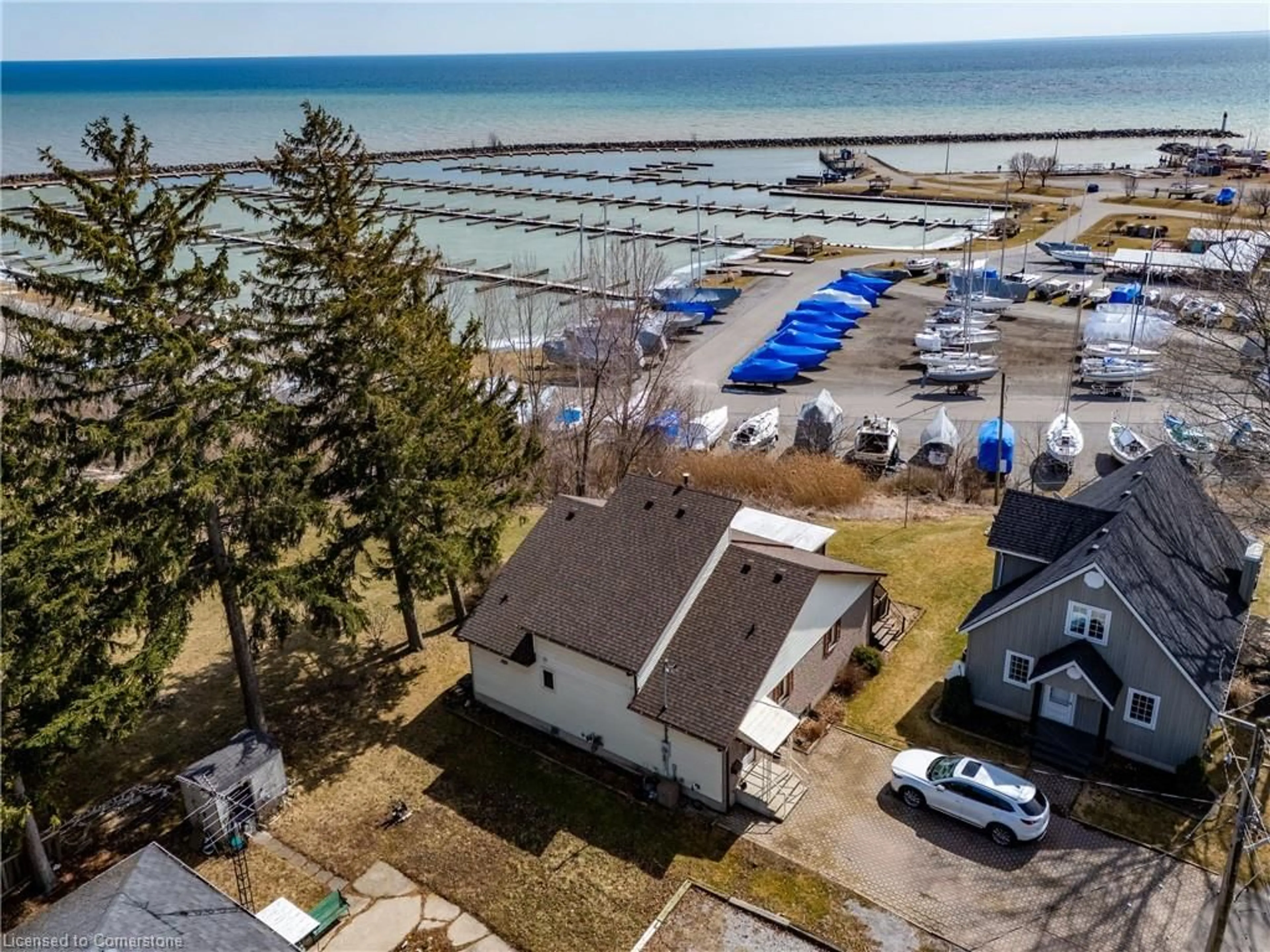 A pic from outside/outdoor area/front of a property/back of a property/a pic from drone, water/lake/river/ocean view for 16 Dean Ave, Port Dover Ontario N0A 1N7