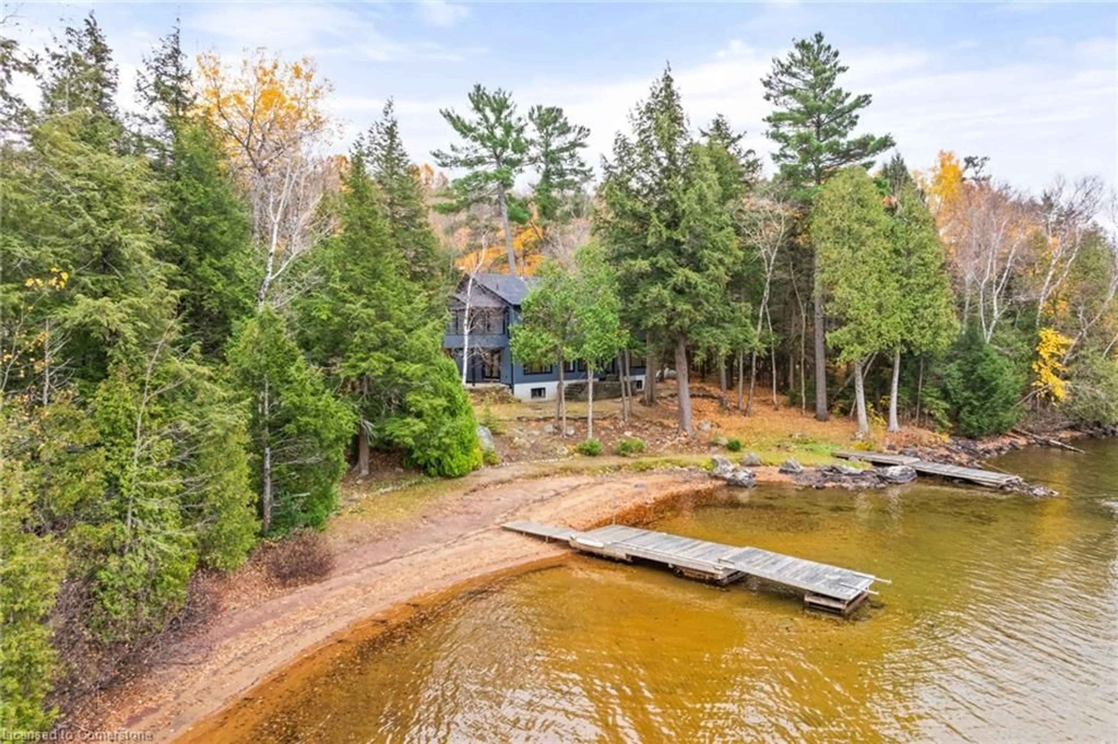 A pic from outside/outdoor area/front of a property/back of a property/a pic from drone, water/lake/river/ocean view for 1009 Scotts Boathouse Rd, Baysville Ontario P0B 1A0