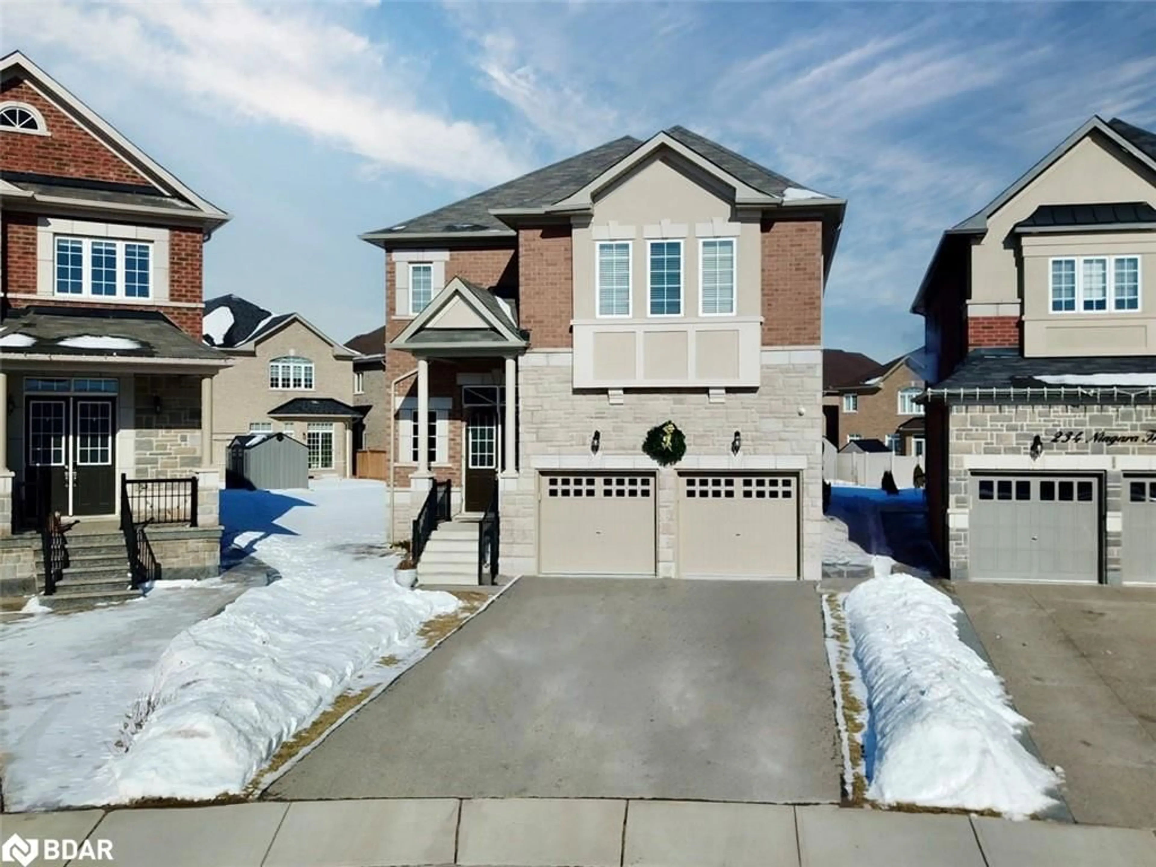 Home with brick exterior material, street for 232 Niagara Trail, Georgetown Ontario L7G 0M4