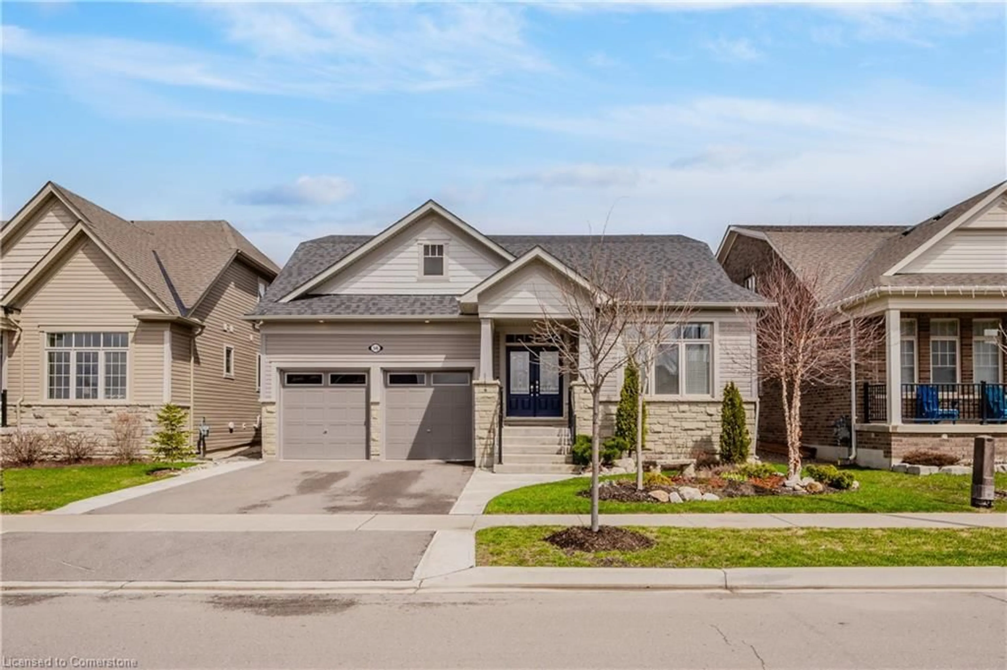 Home with brick exterior material, street for 56 Harpin Way, Fergus Ontario N1M 0H1
