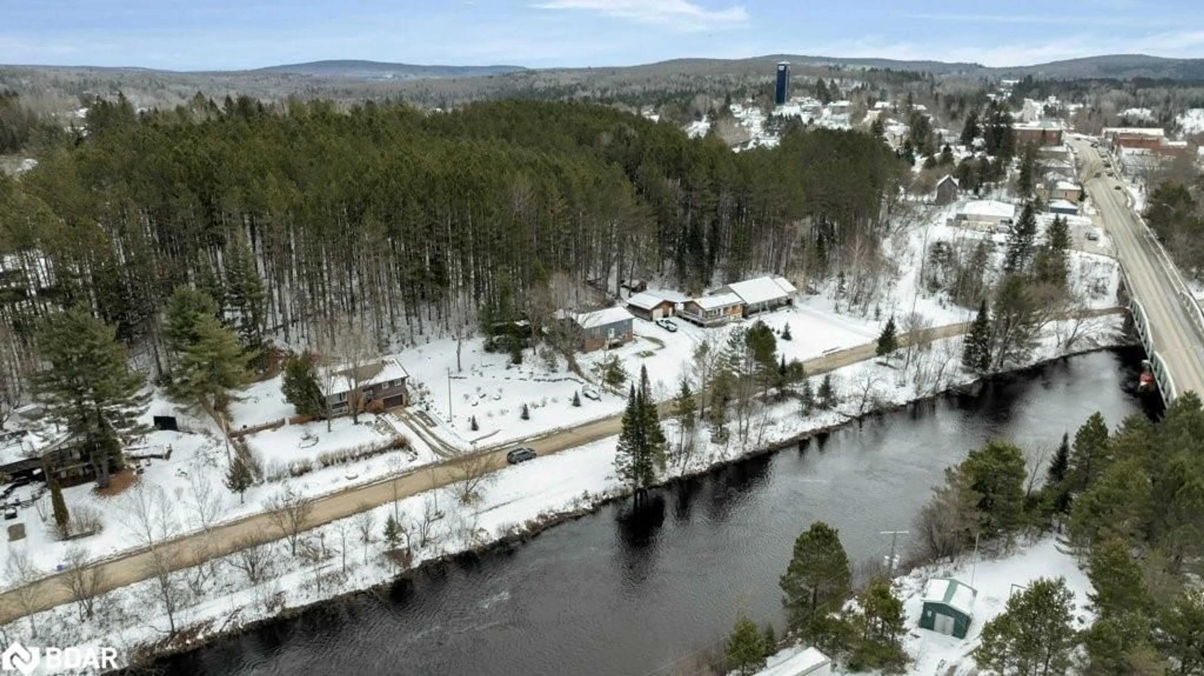 A pic from outside/outdoor area/front of a property/back of a property/a pic from drone, water/lake/river/ocean view for 313 Syples St, Burk's Falls Ontario P0A 1C0