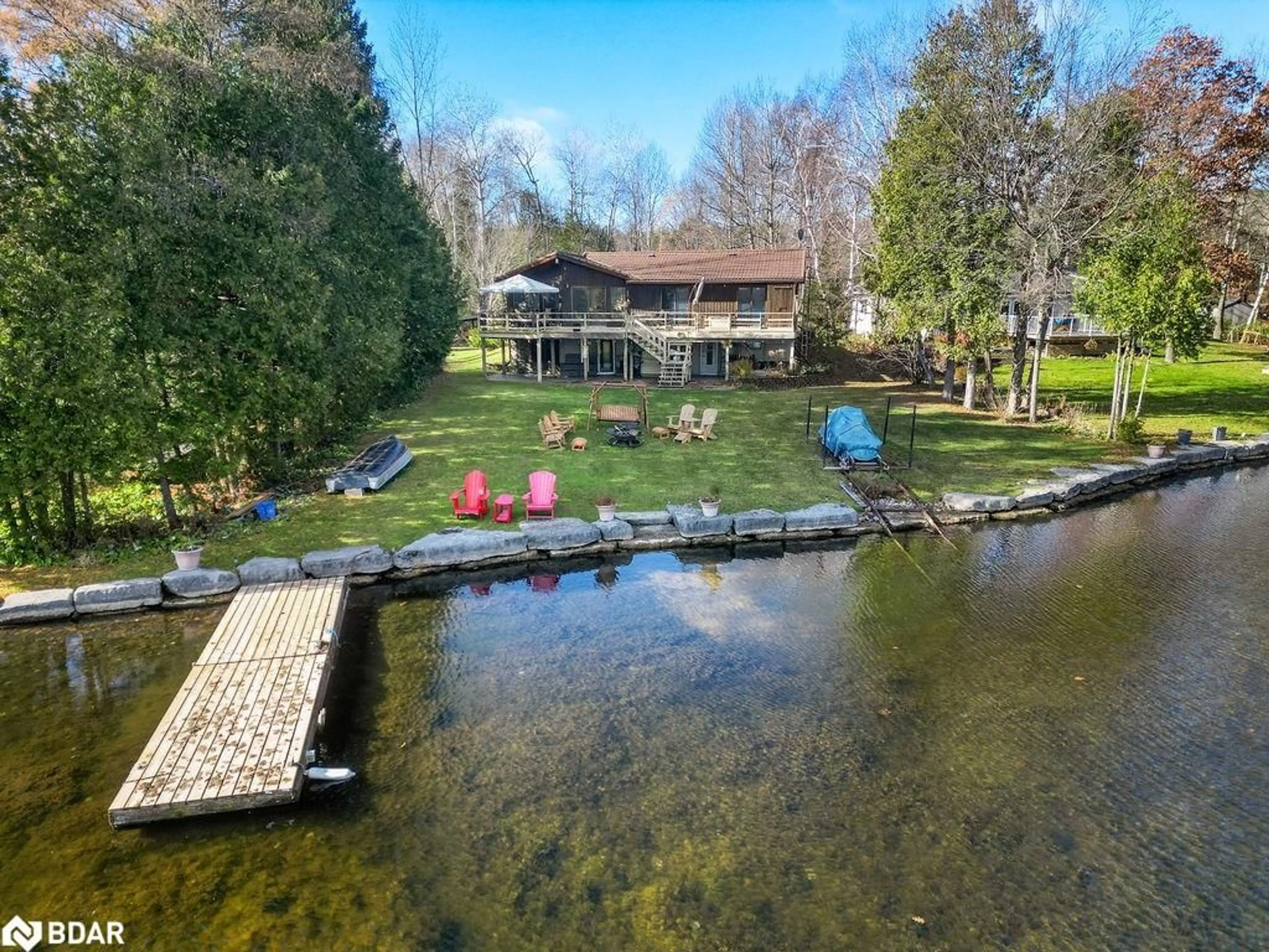 A pic from outside/outdoor area/front of a property/back of a property/a pic from drone, water/lake/river/ocean view for 217 Adam And Eve Rd, Buckhorn Ontario K0L 1J0