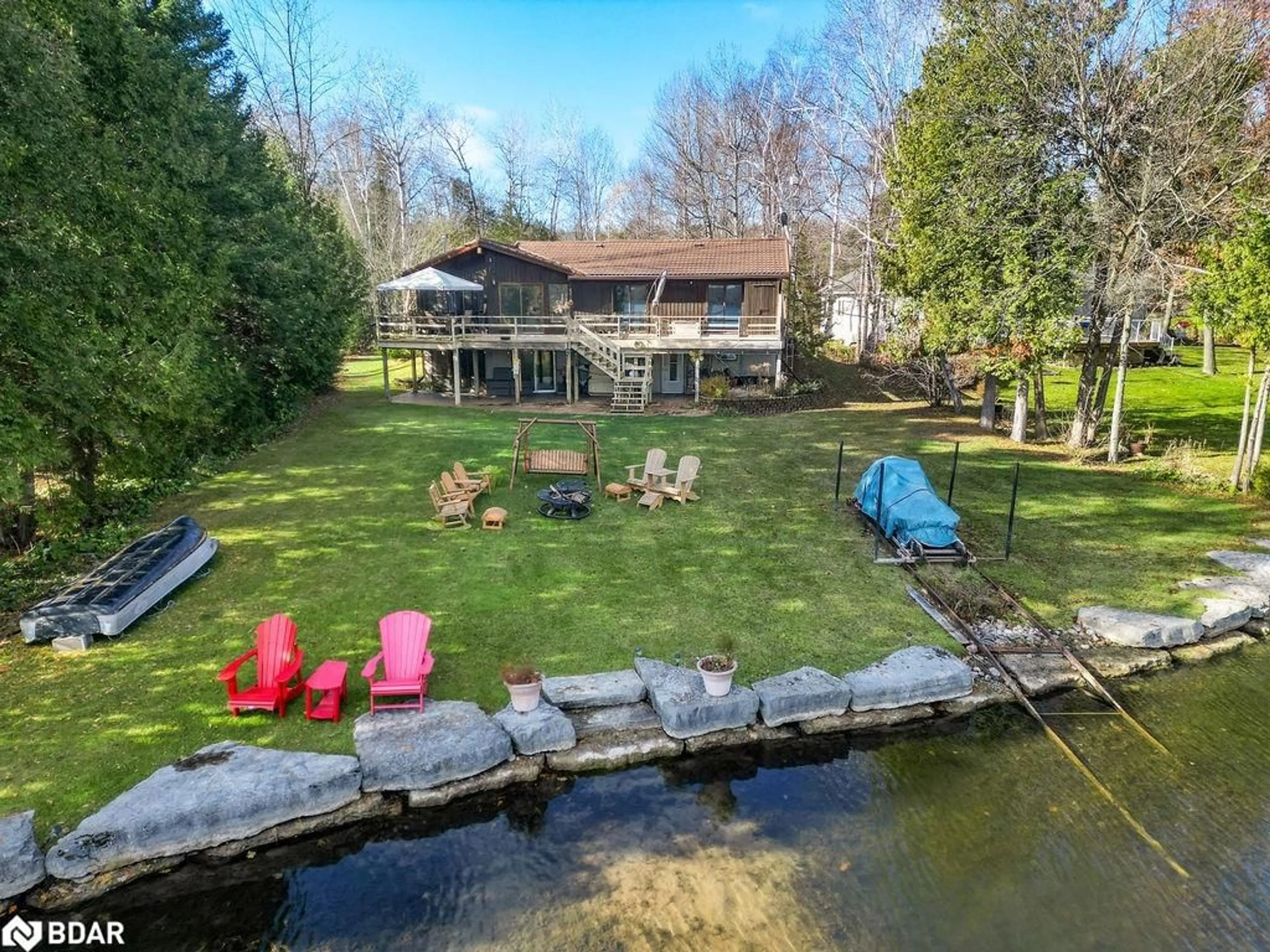 A pic from outside/outdoor area/front of a property/back of a property/a pic from drone, water/lake/river/ocean view for 217 Adam And Eve Rd, Buckhorn Ontario K0L 1J0