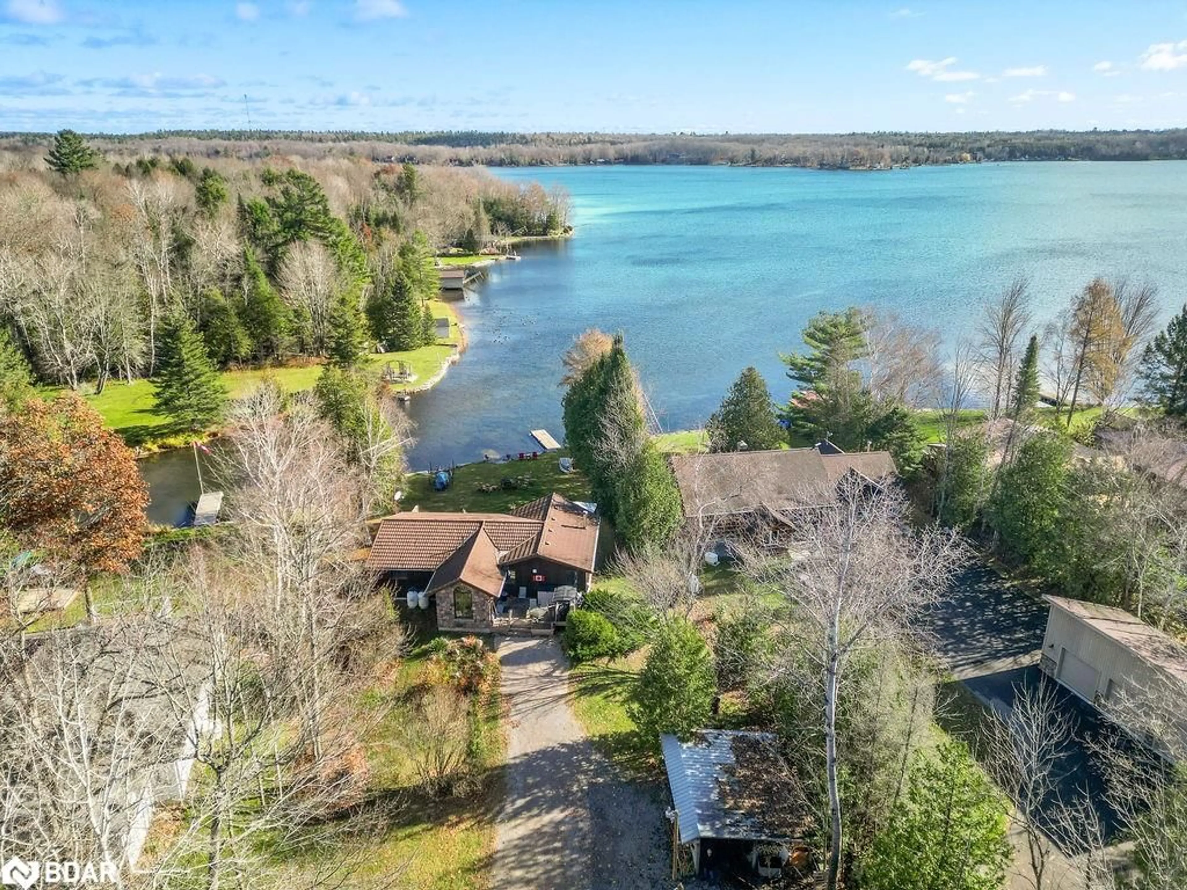 A pic from outside/outdoor area/front of a property/back of a property/a pic from drone, water/lake/river/ocean view for 217 Adam And Eve Rd, Buckhorn Ontario K0L 1J0