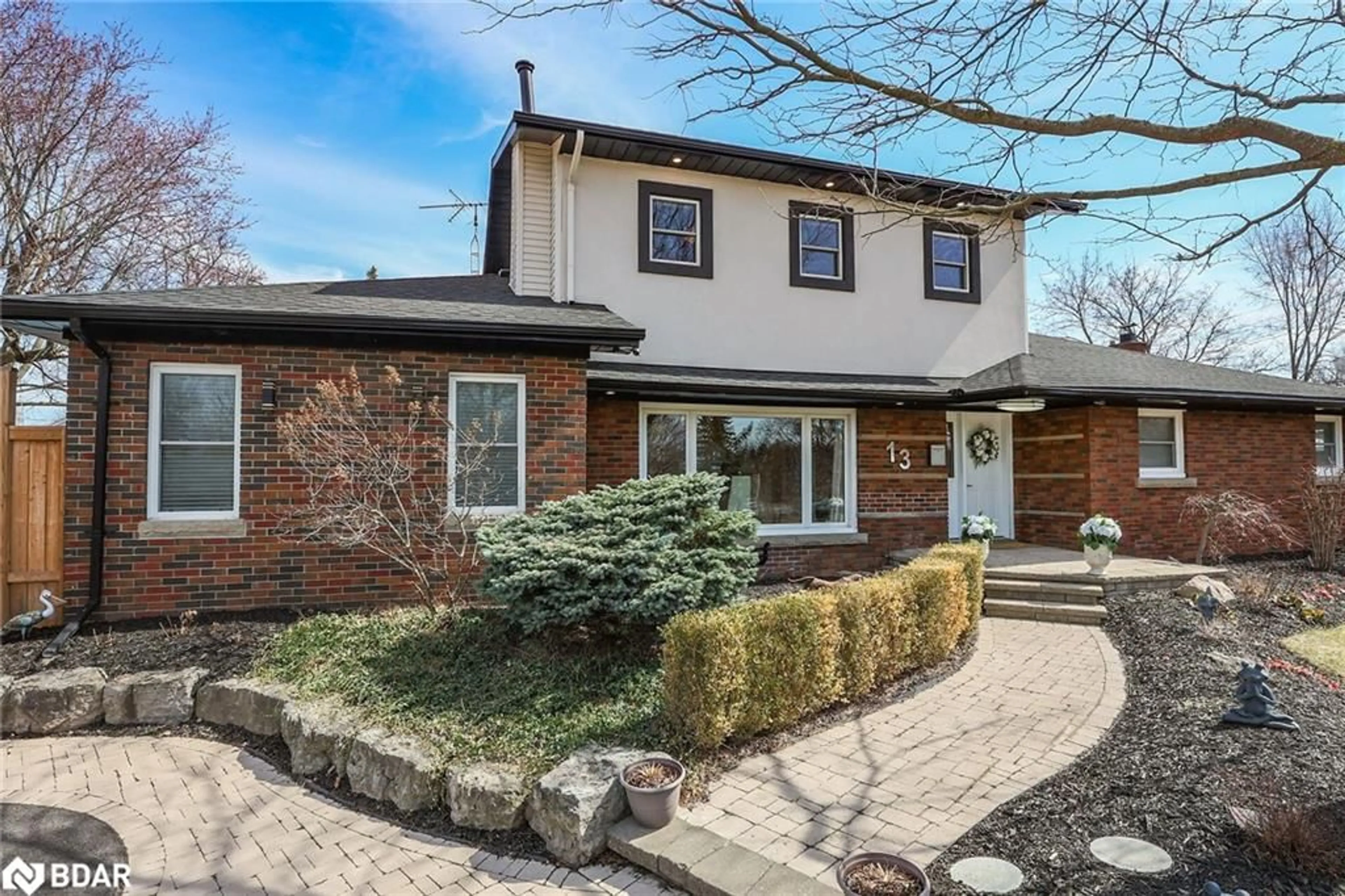 Home with brick exterior material, street for 13 Marsdale Dr, St. Catharines Ontario L2T 3S1