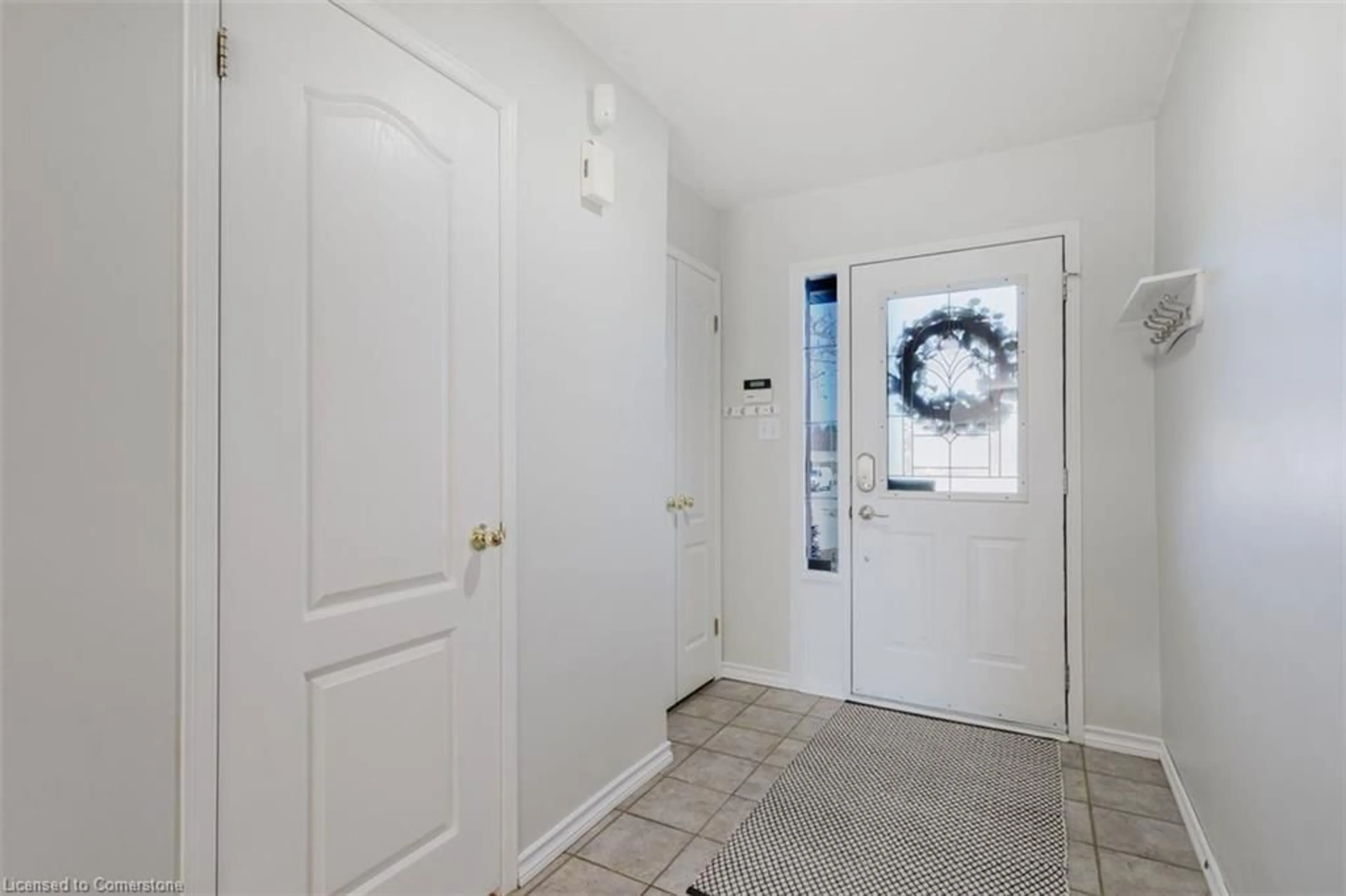 Indoor entryway for 66 Foxborough Rd, Ancaster Ontario L9G 4Y8