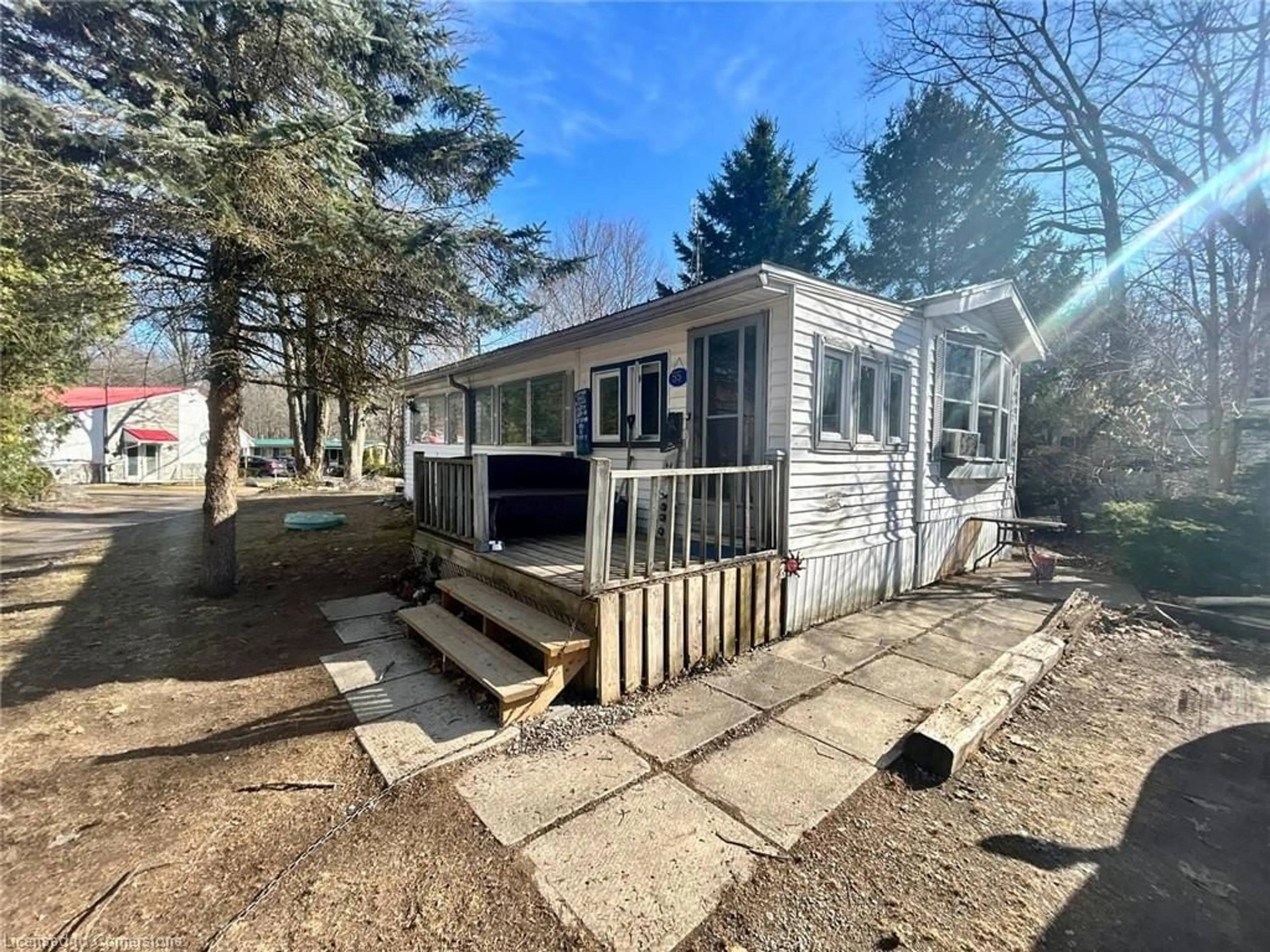 A pic from outside/outdoor area/front of a property/back of a property/a pic from drone, water/lake/river/ocean view for 334 Rattlesnake Rd #55, Lowbanks Ontario N0A 1K0