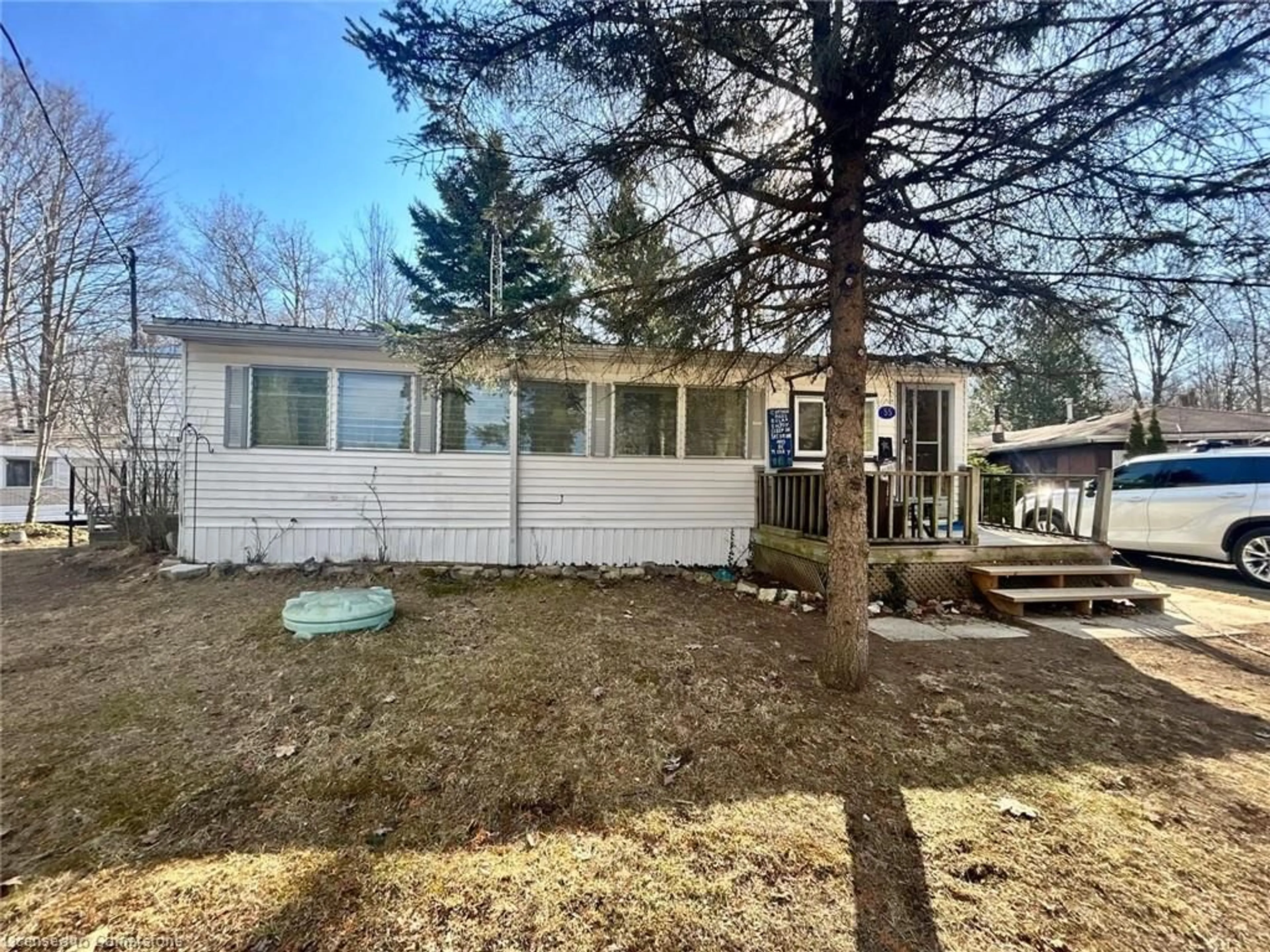 A pic from outside/outdoor area/front of a property/back of a property/a pic from drone, unknown for 334 Rattlesnake Rd #55, Lowbanks Ontario N0A 1K0