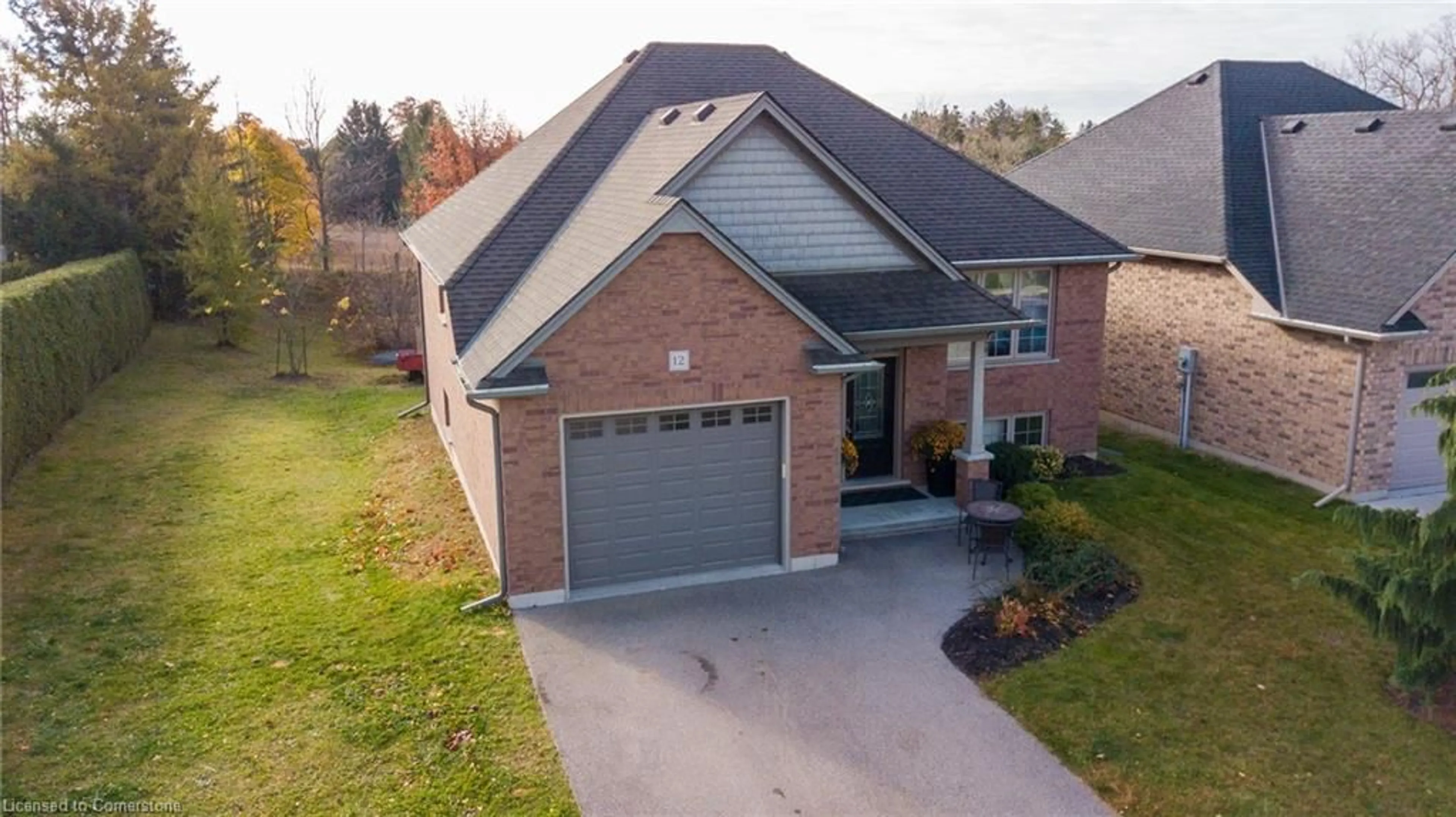 Home with brick exterior material, street for 12 Cottonwood St, Waterford Ontario N0E 1Y0