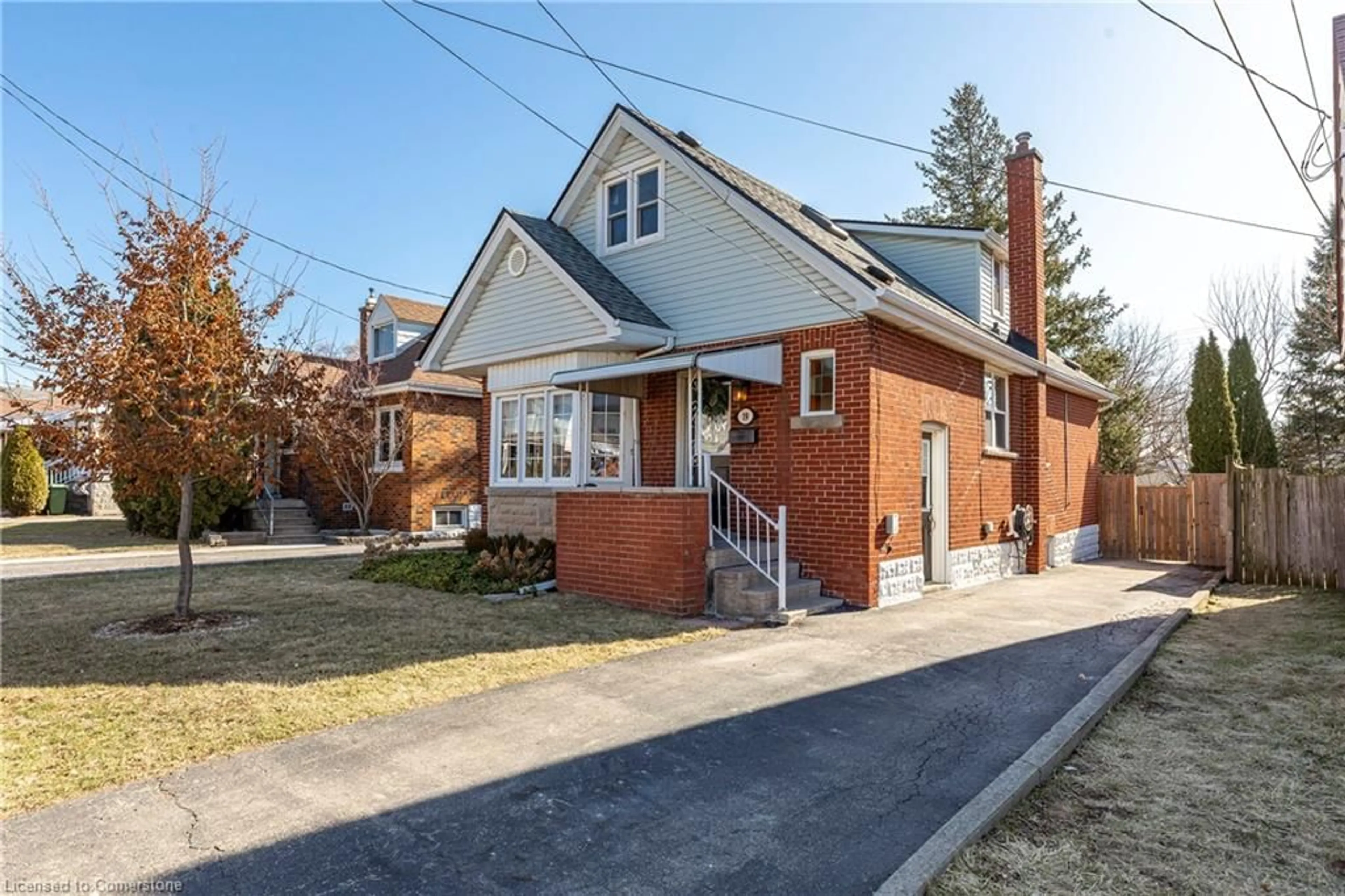 Home with brick exterior material, street for 19 Woodbridge Rd, Hamilton Ontario L8K 3C6