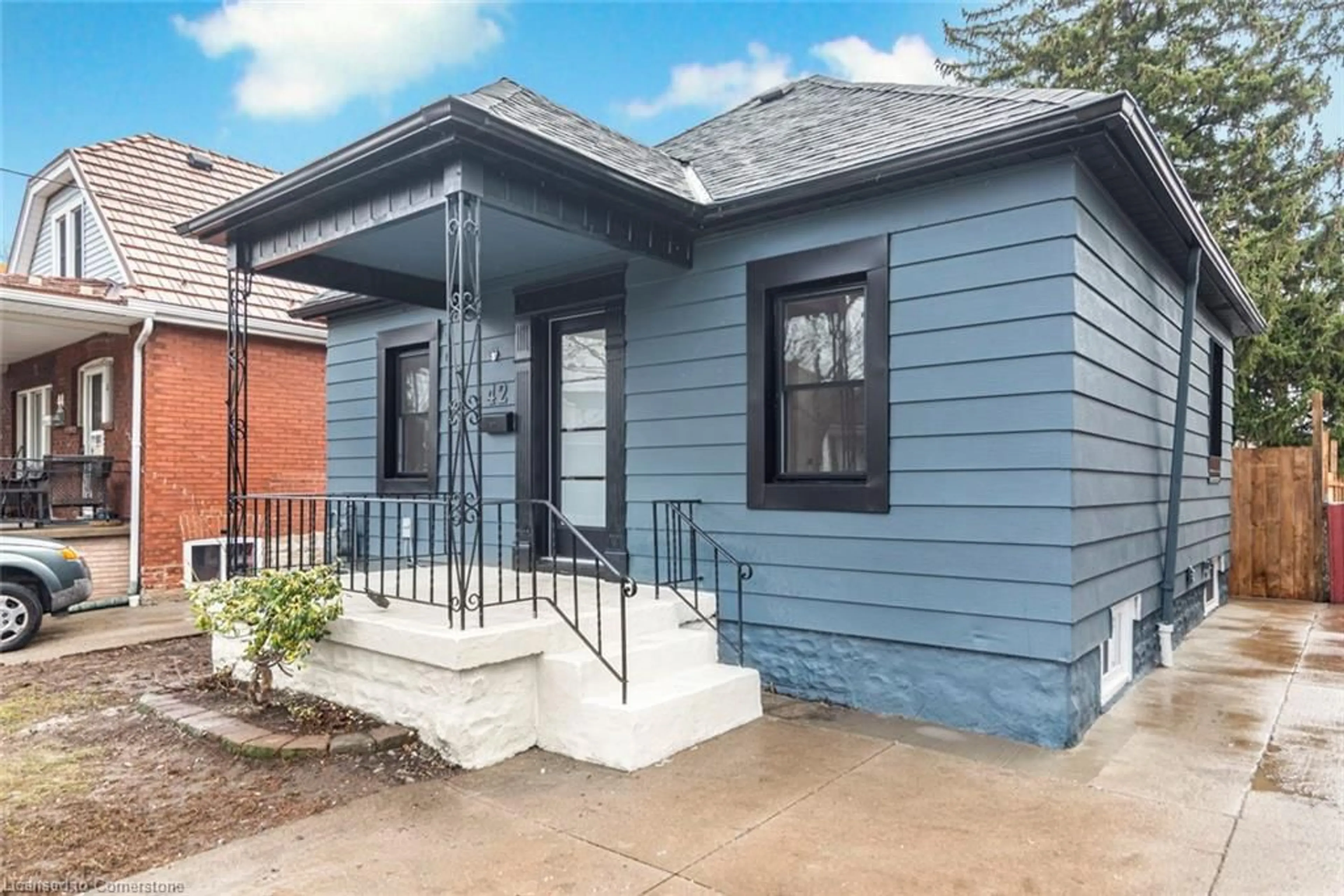 Home with brick exterior material, street for 42 Cameron Ave, Hamilton Ontario L8H 4Y8