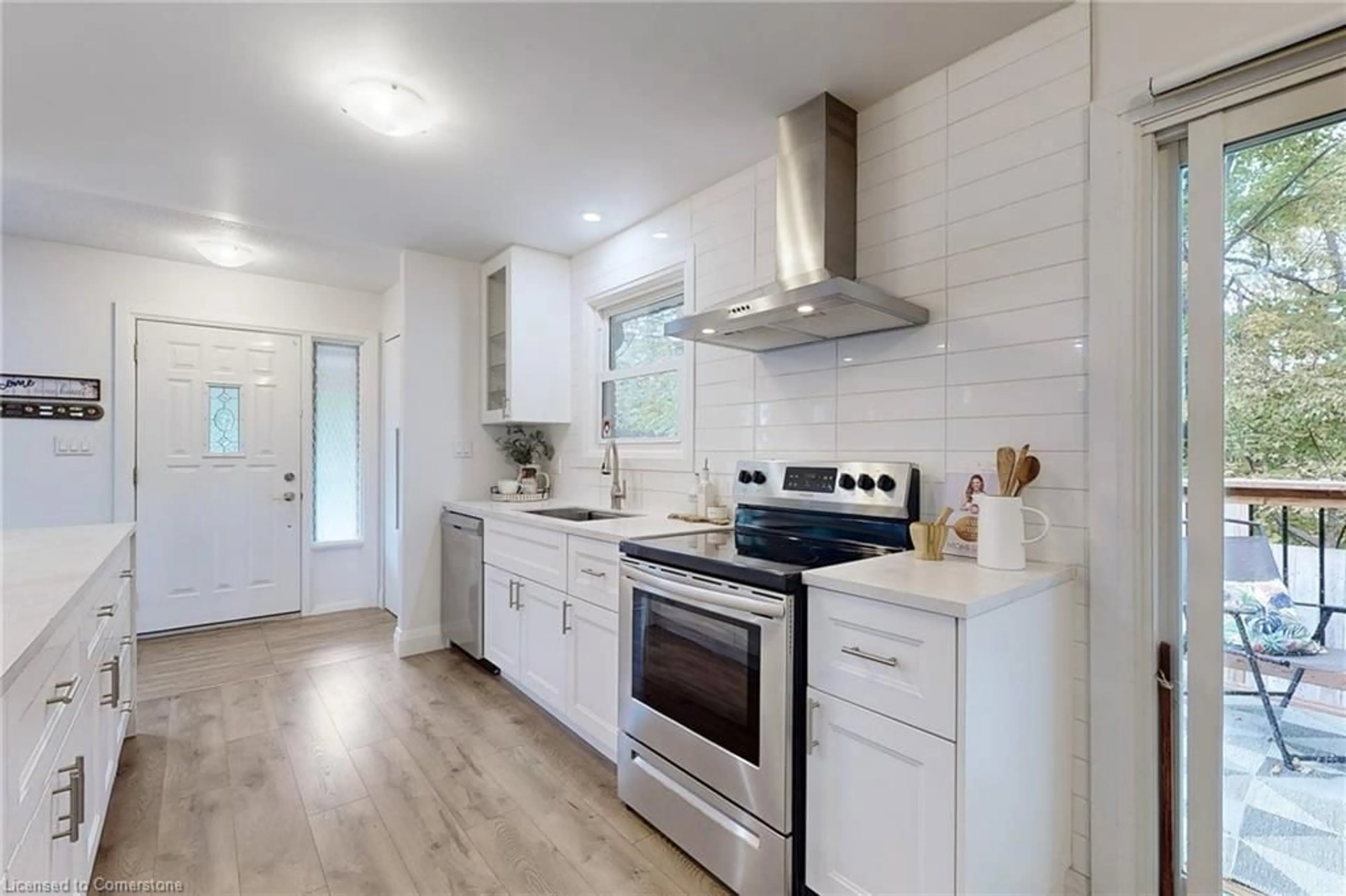 Open concept kitchen, unknown for 49 Quigley Rd, Hamilton Ontario L8K 6K9