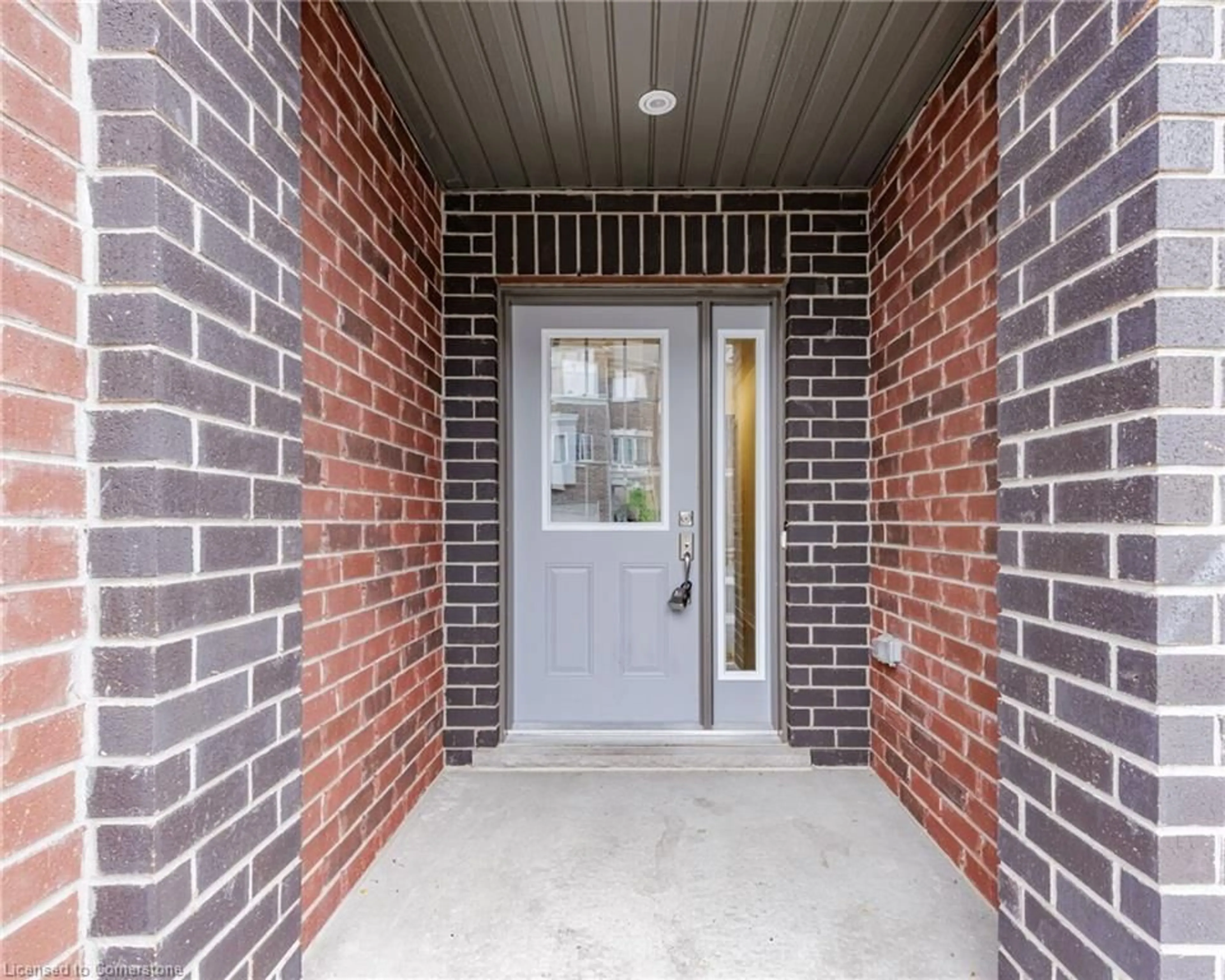 Home with brick exterior material, street for 311 Woolwich St #5, Waterloo Ontario N2K 0H4