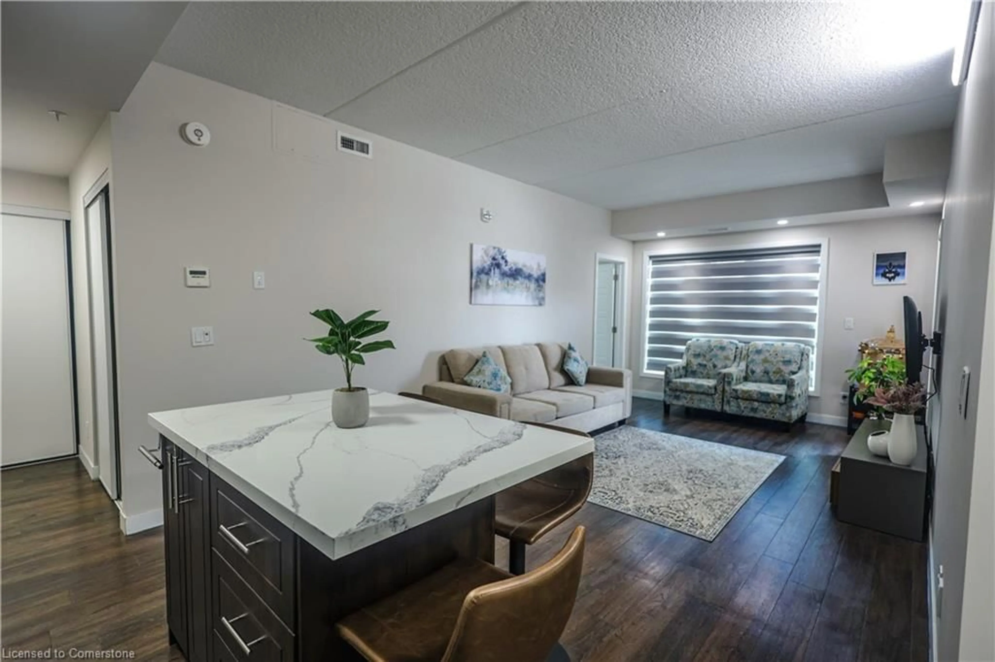 Living room with furniture, unknown for 175 Commonwealth St #205, Kitchener Ontario N2E 0H4