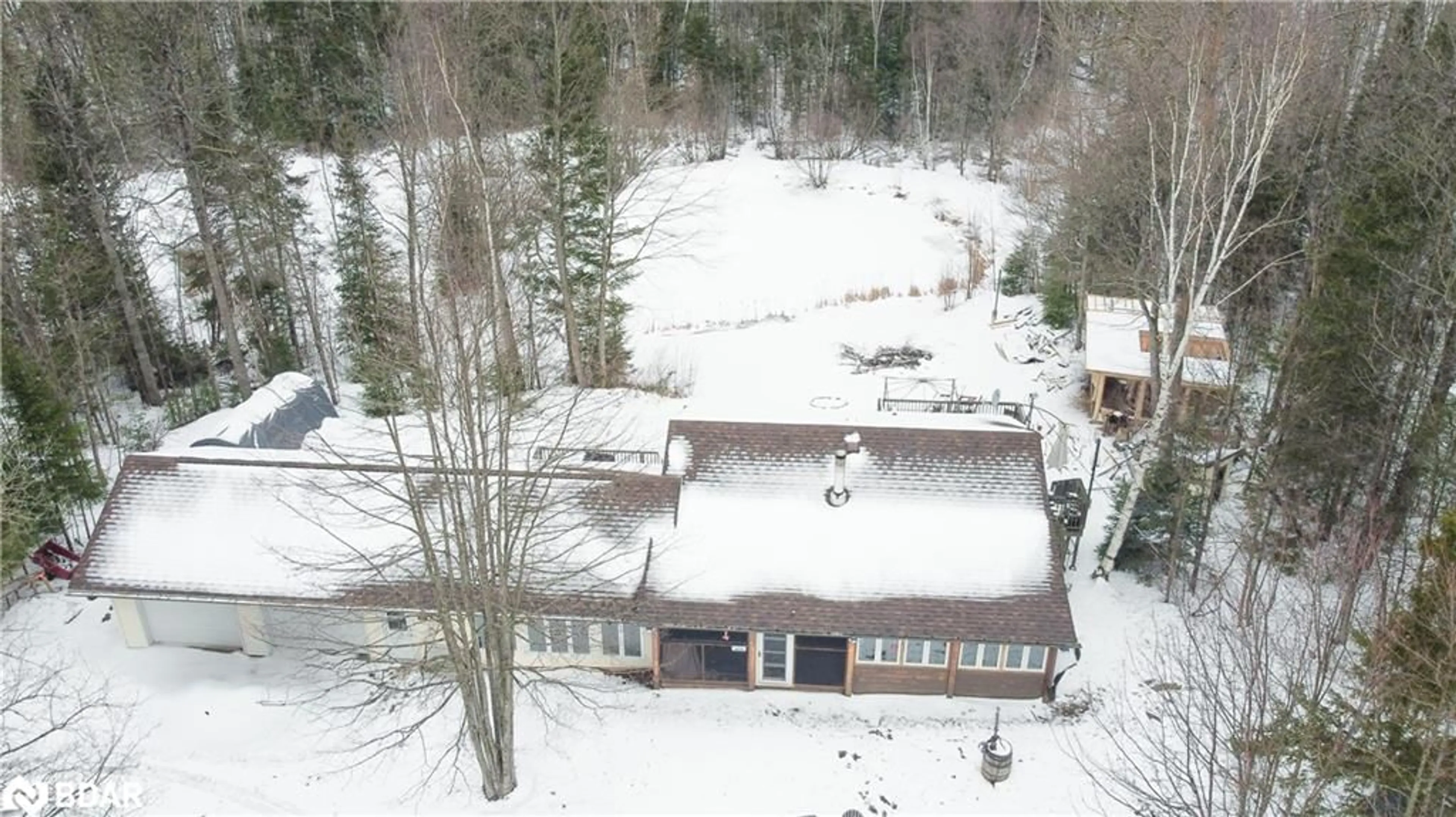A pic from outside/outdoor area/front of a property/back of a property/a pic from drone, unknown for 1170 English Circle Cir, Haliburton Ontario K0M 1R0