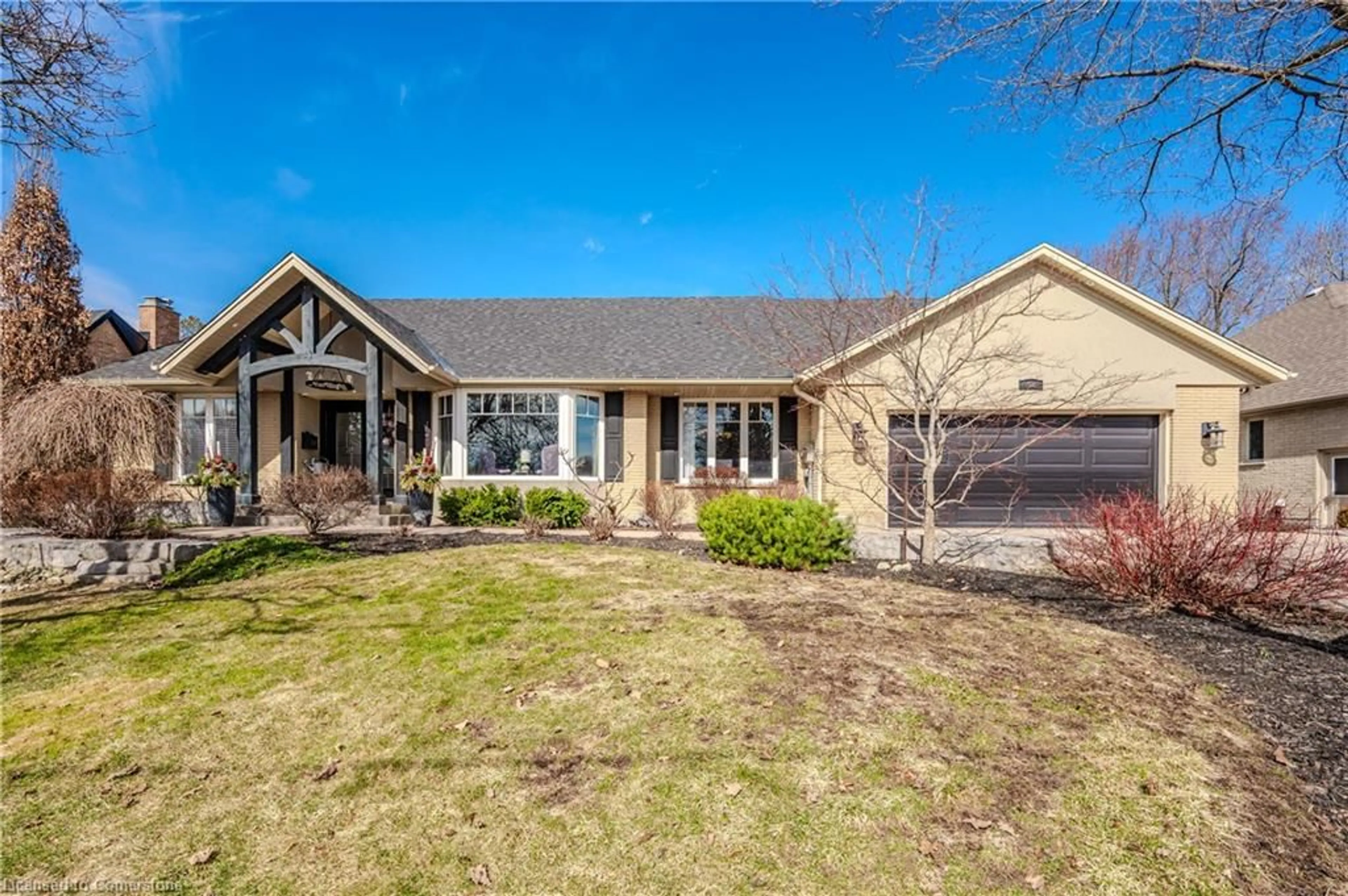 Home with brick exterior material, street for 58 Waverley Dr, Guelph Ontario N1E 6C8