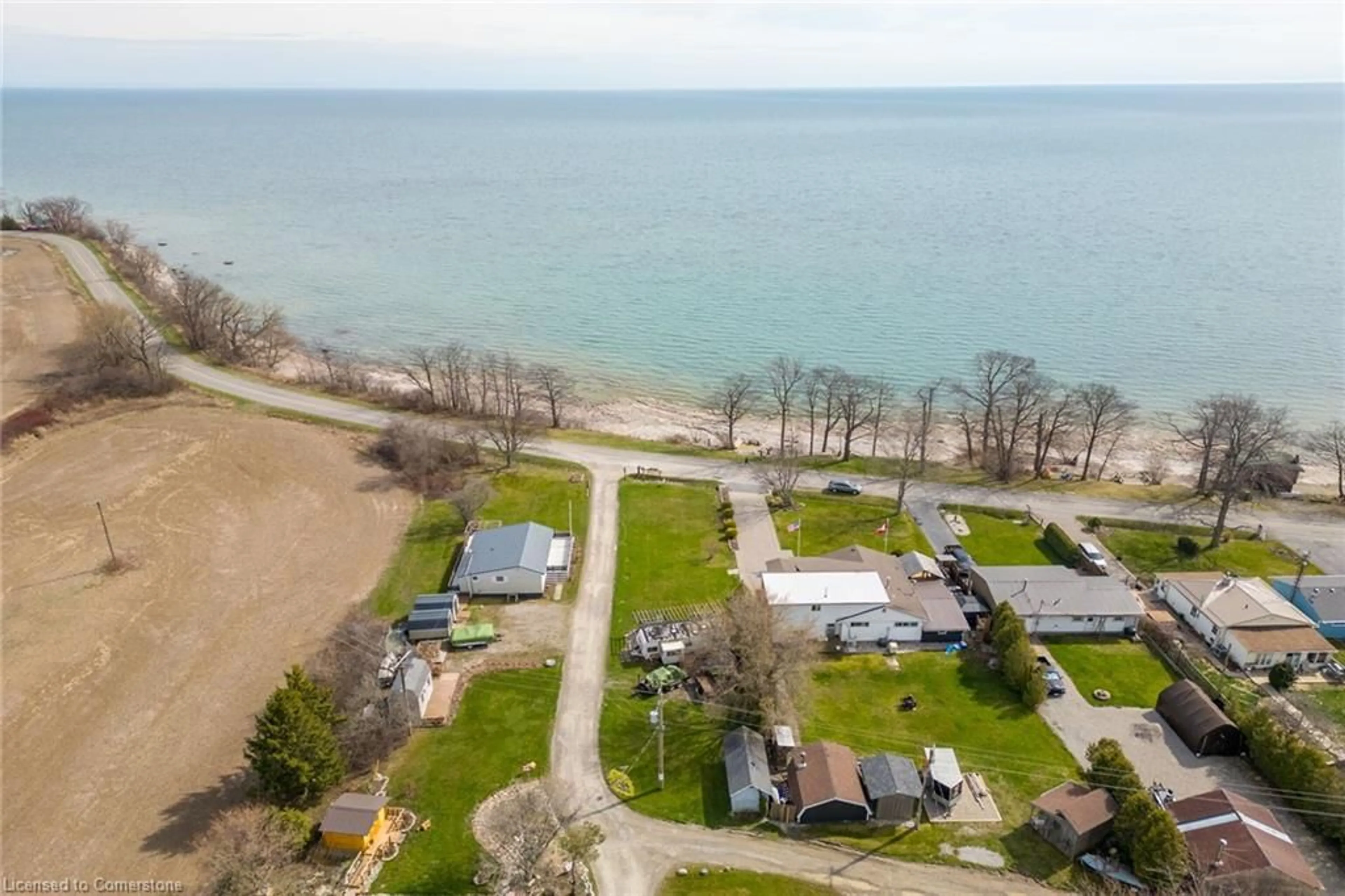 A pic from outside/outdoor area/front of a property/back of a property/a pic from drone, water/lake/river/ocean view for 307 Lakeshore Rd, Selkirk Ontario N0A 1P0