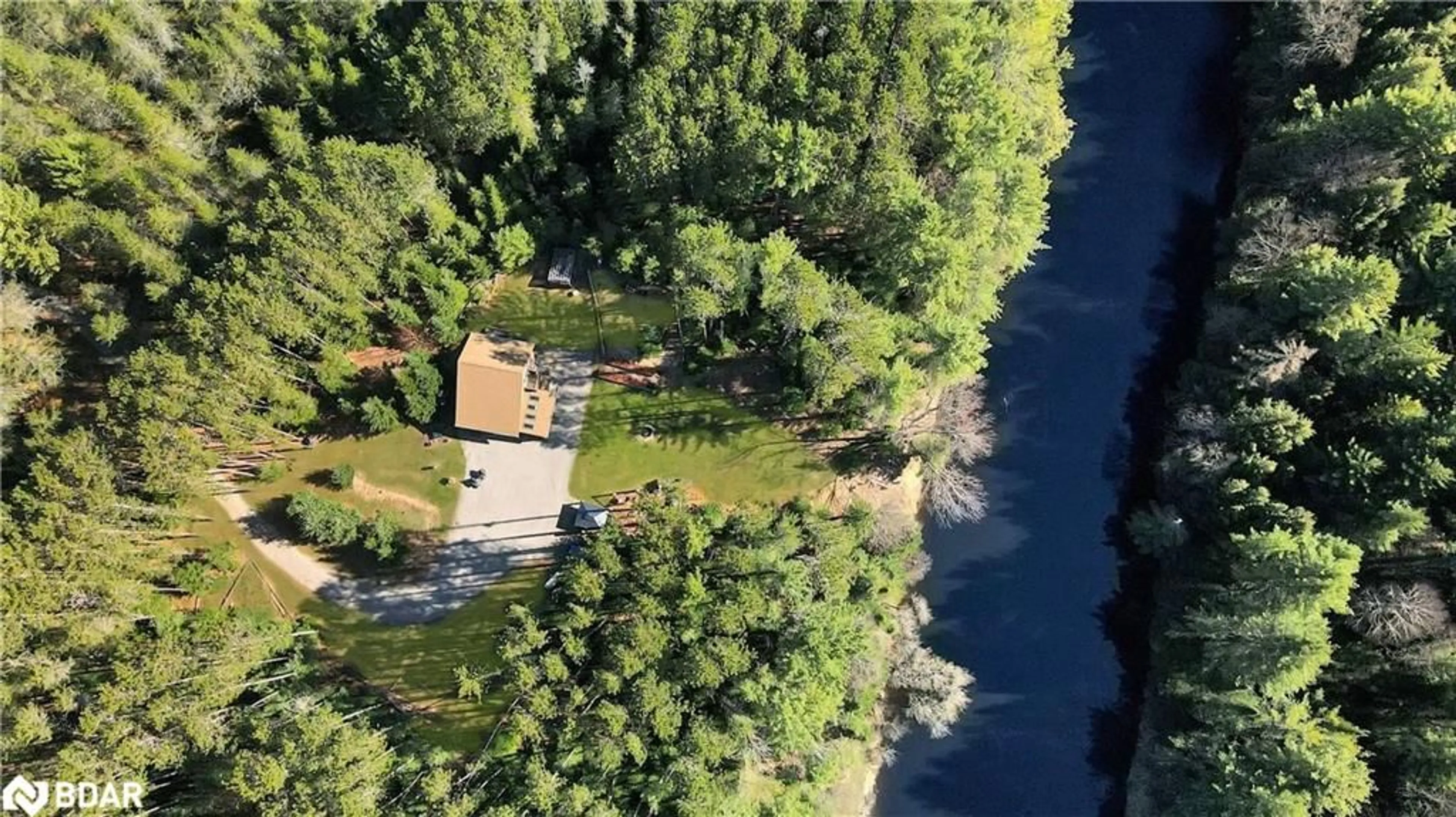 A pic from outside/outdoor area/front of a property/back of a property/a pic from drone, water/lake/river/ocean view for 22 Winchester Dr, Burnt River Ontario K0M 1C0