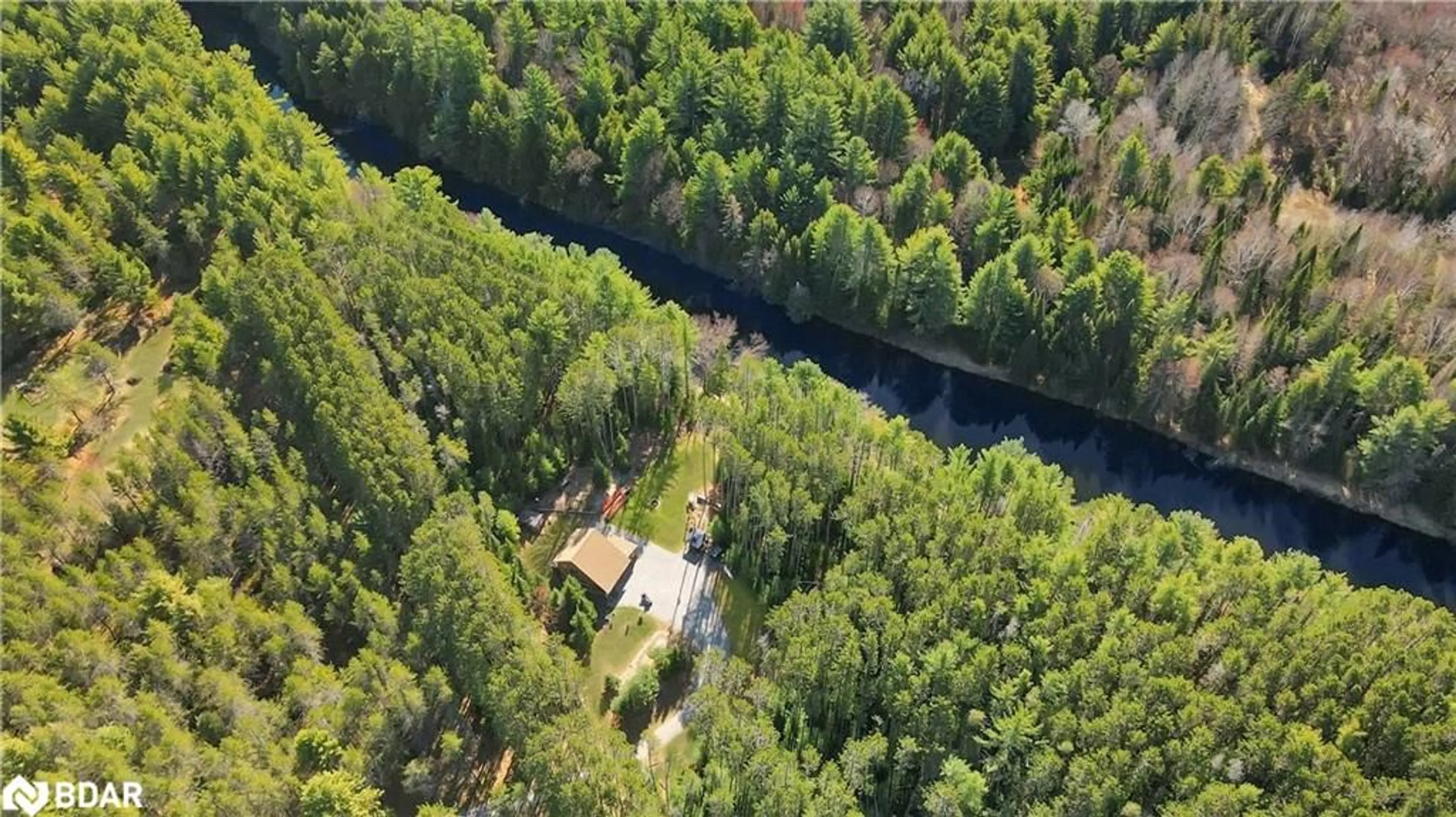 A pic from outside/outdoor area/front of a property/back of a property/a pic from drone, water/lake/river/ocean view for 22 Winchester Dr, Burnt River Ontario K0M 1C0