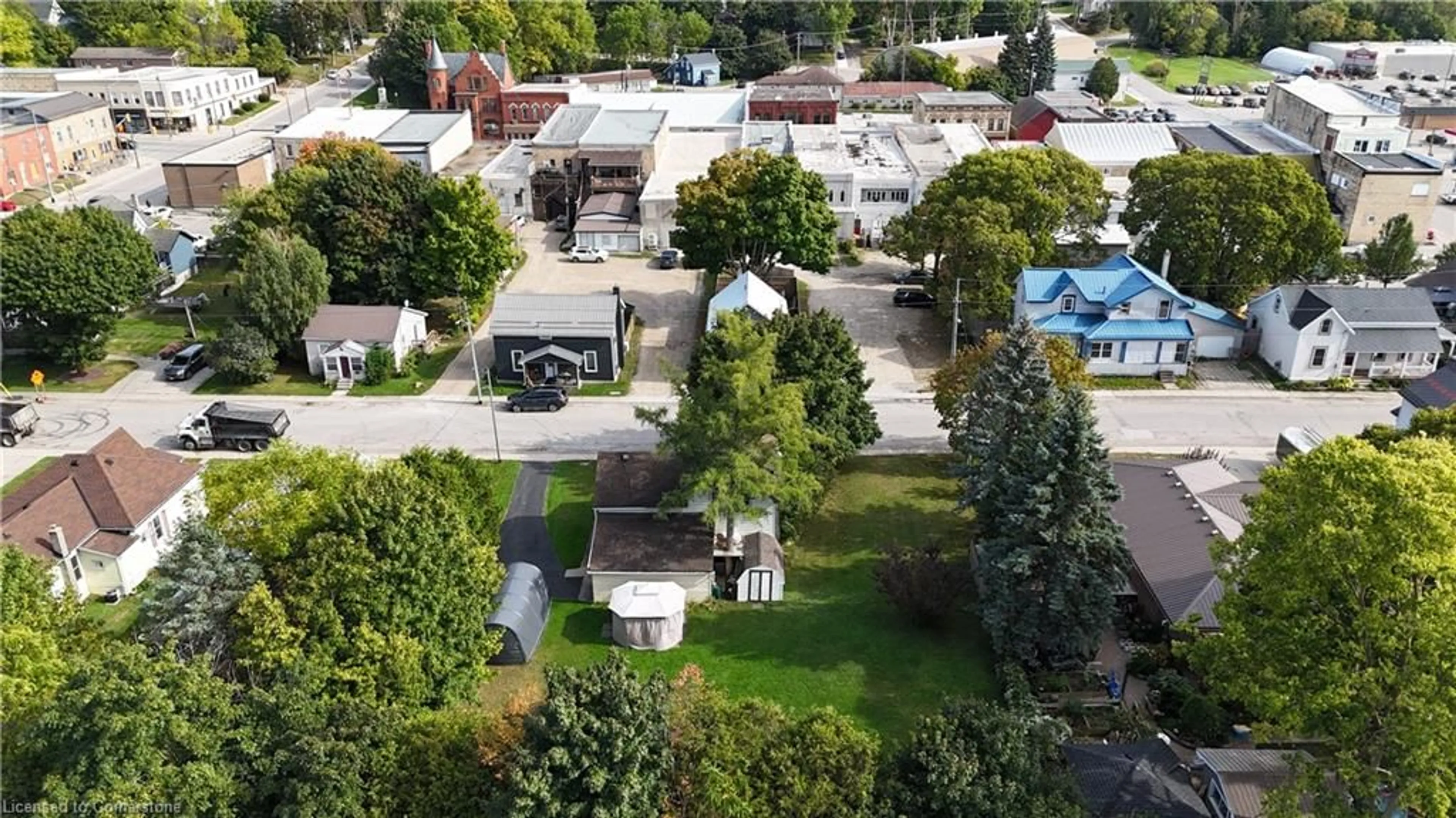 A pic from outside/outdoor area/front of a property/back of a property/a pic from drone, street for 208 Edward St, Wingham Ontario N0G 2W0