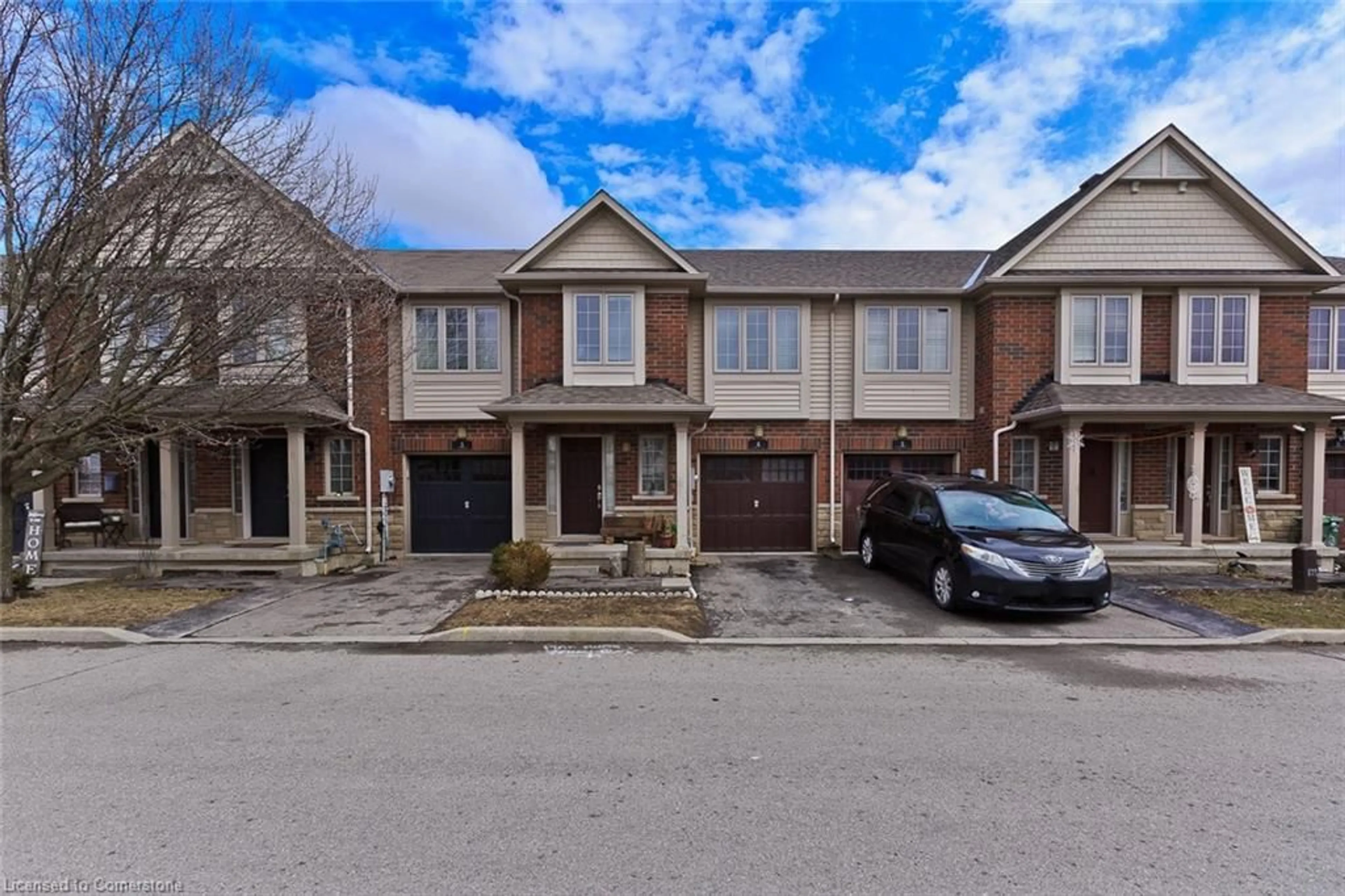 A pic from outside/outdoor area/front of a property/back of a property/a pic from drone, street for 222 Fall Fair Way #4, Binbrook Ontario L0R 1C0
