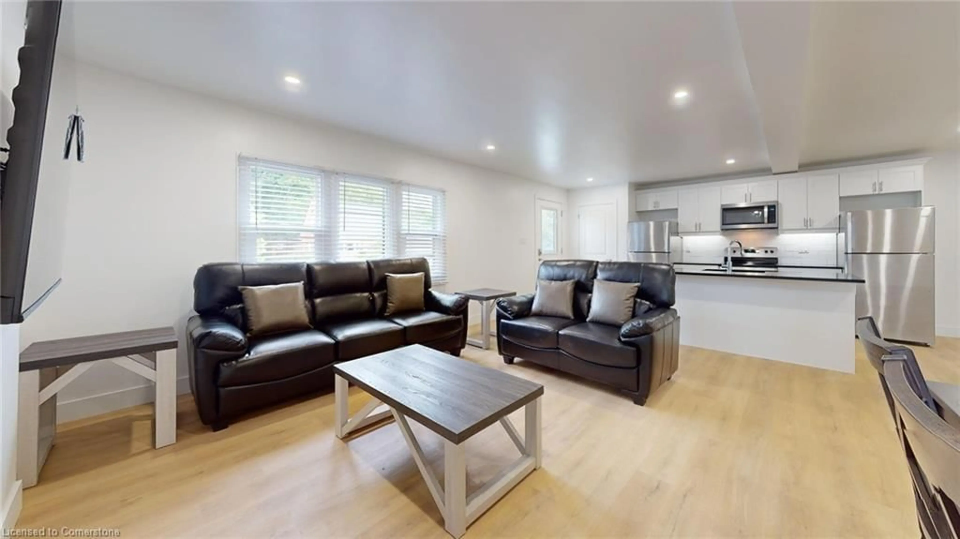 Living room with furniture, wood/laminate floor for 38 Albion St, London Ontario N6H 1Z2