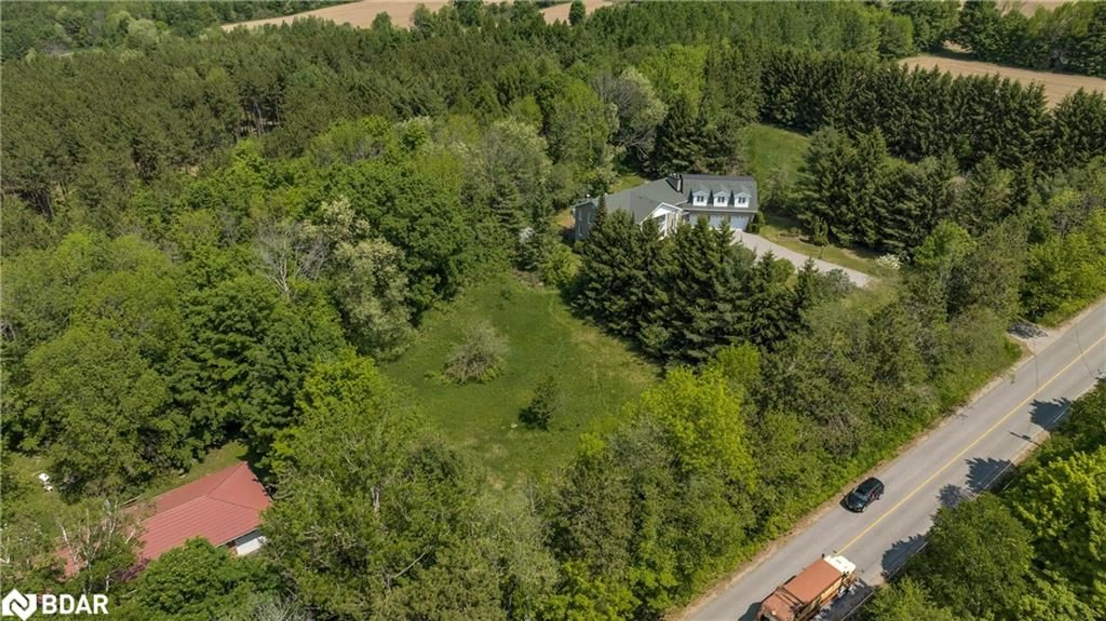 A pic from outside/outdoor area/front of a property/back of a property/a pic from drone, forest/trees view for PART 1 - 712 Mt St Louis Rd, Oro-Medonte Ontario L0L 1V0