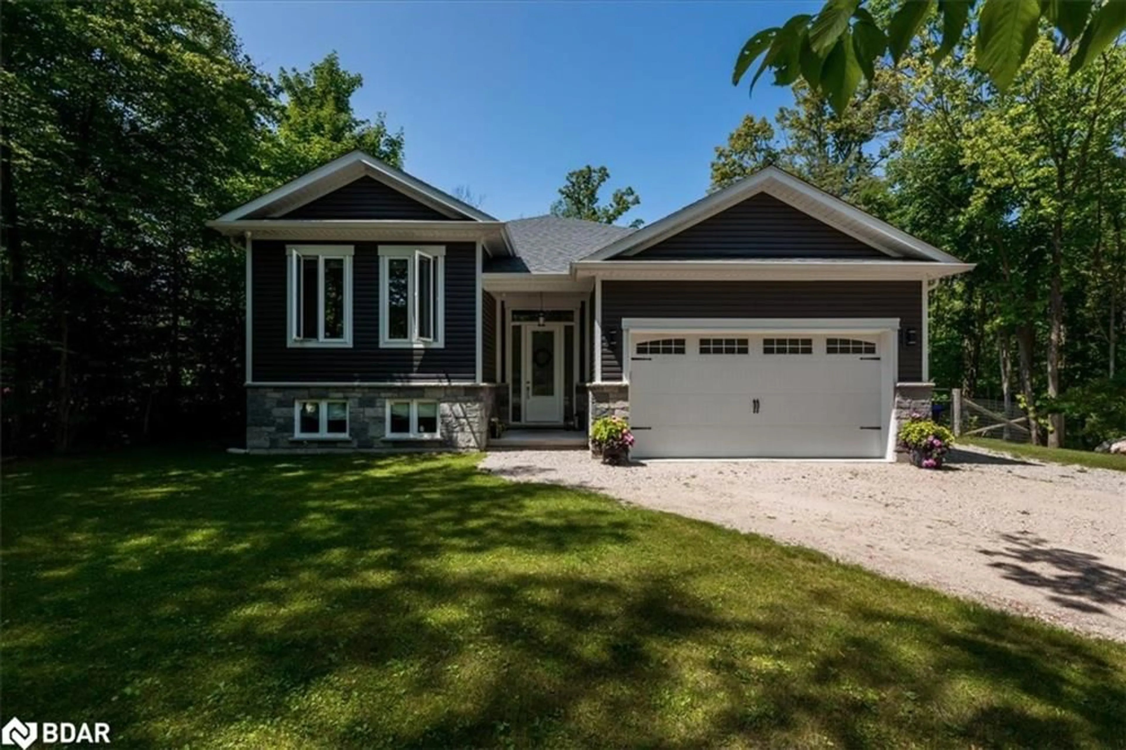 Home with vinyl exterior material, street for 2435 Champlain Rd, Tiny Ontario L9M 0C3