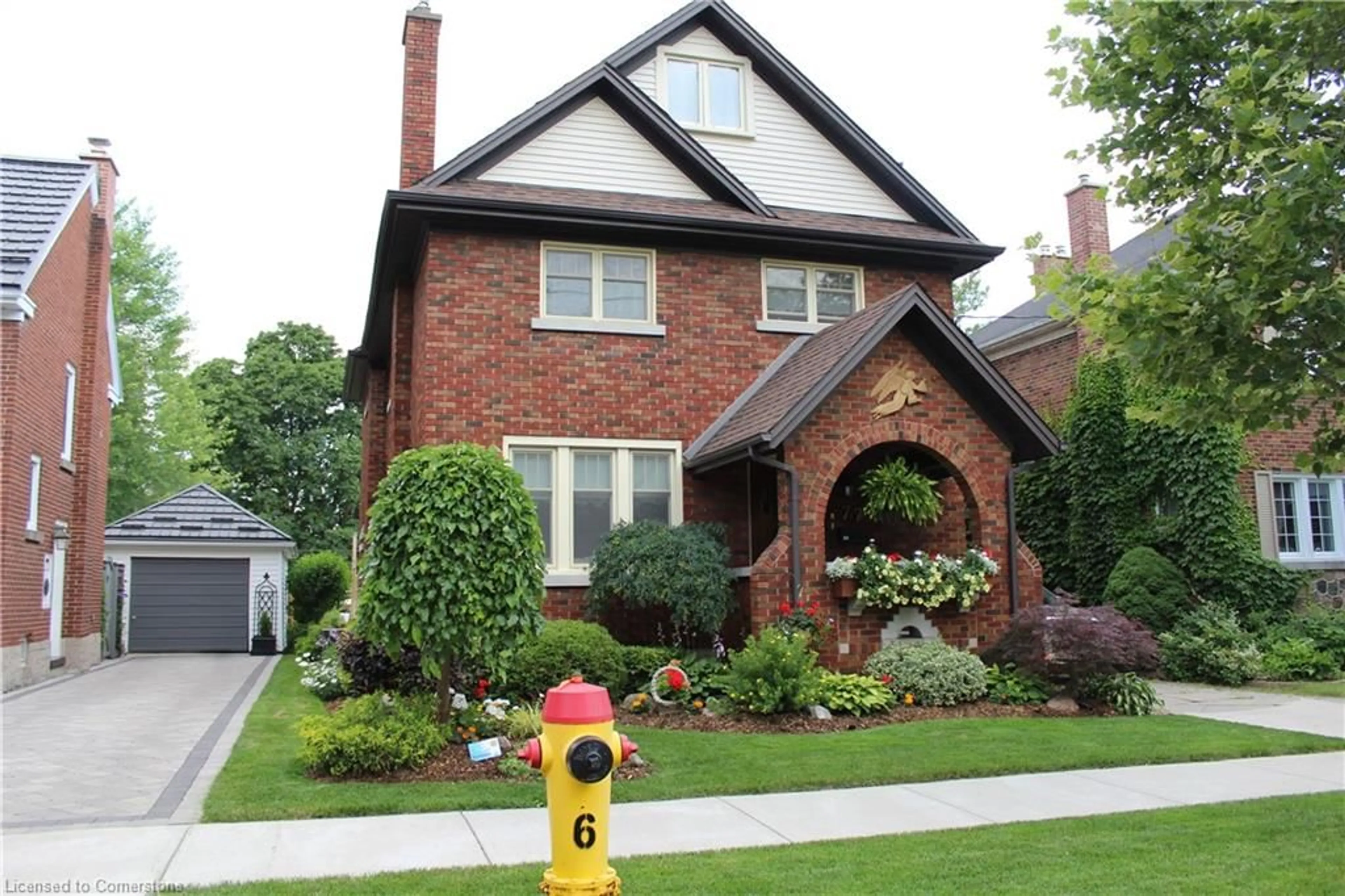 Home with brick exterior material, street for 77 Borden Ave, Kitchener Ontario N2H 3J2