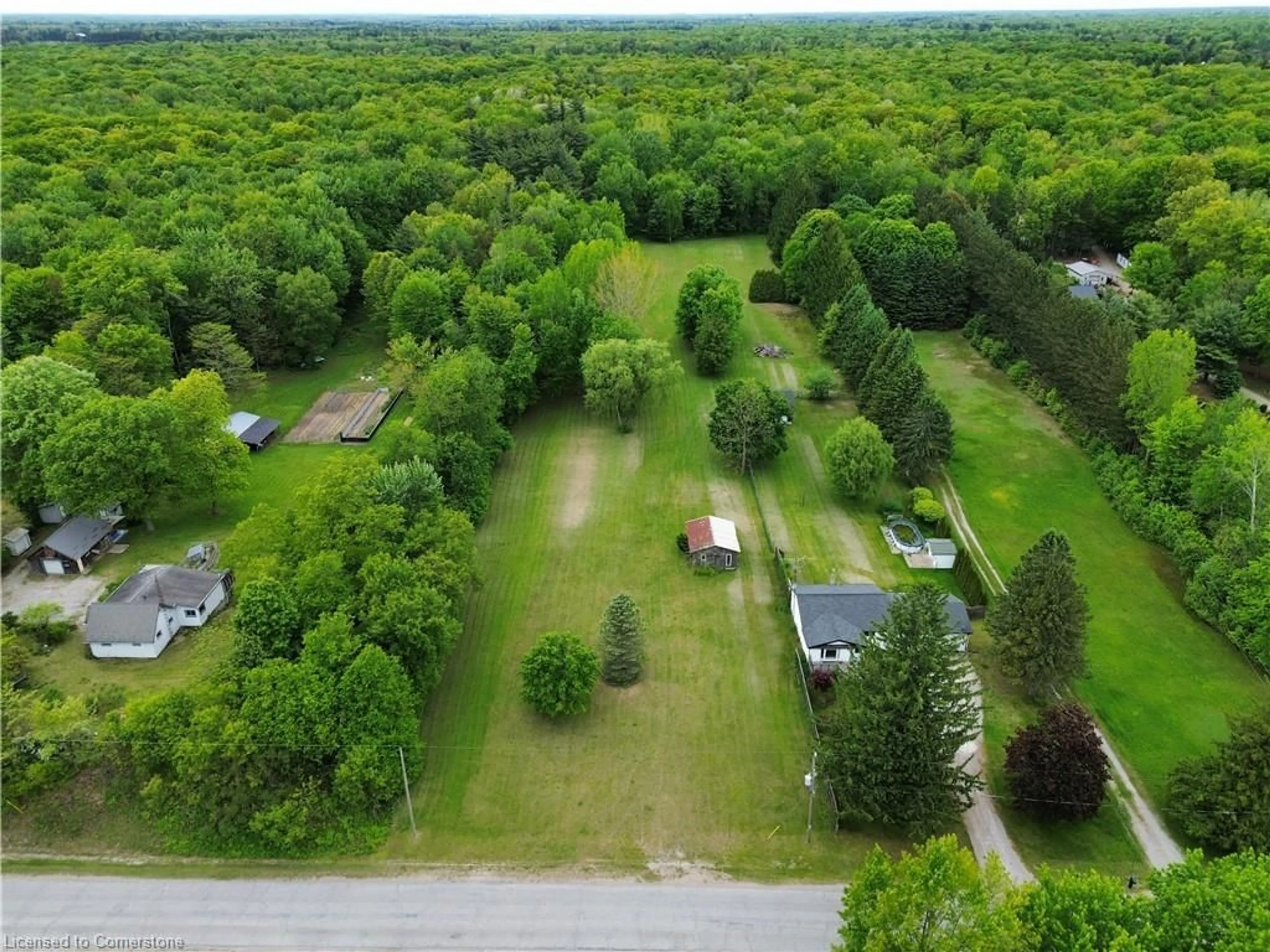 A pic from outside/outdoor area/front of a property/back of a property/a pic from drone, forest/trees view for 871 Charlotteville 8 Rd, Simcoe Ontario N3Y 4K5