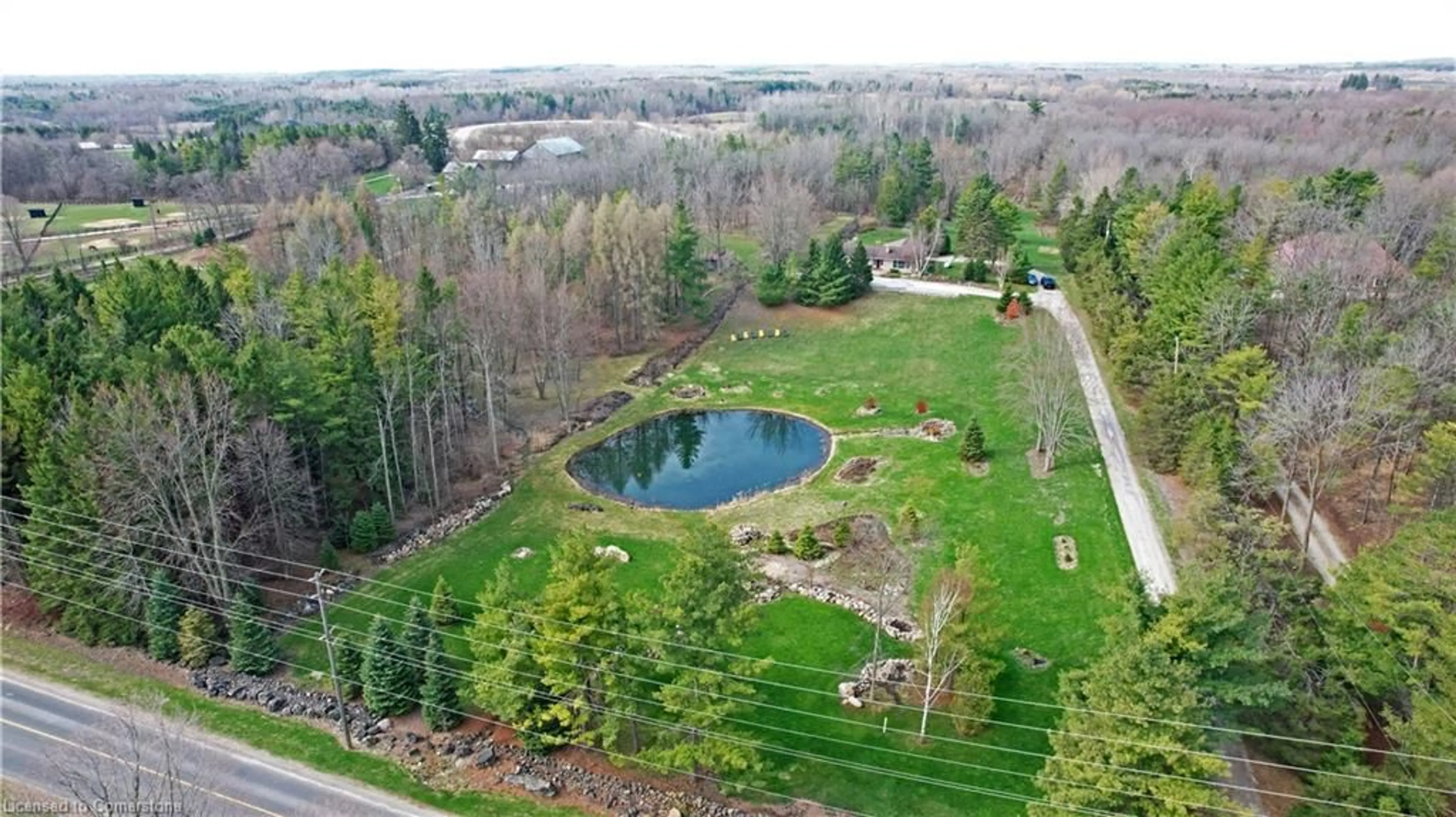 A pic from outside/outdoor area/front of a property/back of a property/a pic from drone, water/lake/river/ocean view for 10566 Second Line, Campbellville Ontario L0P 1B0