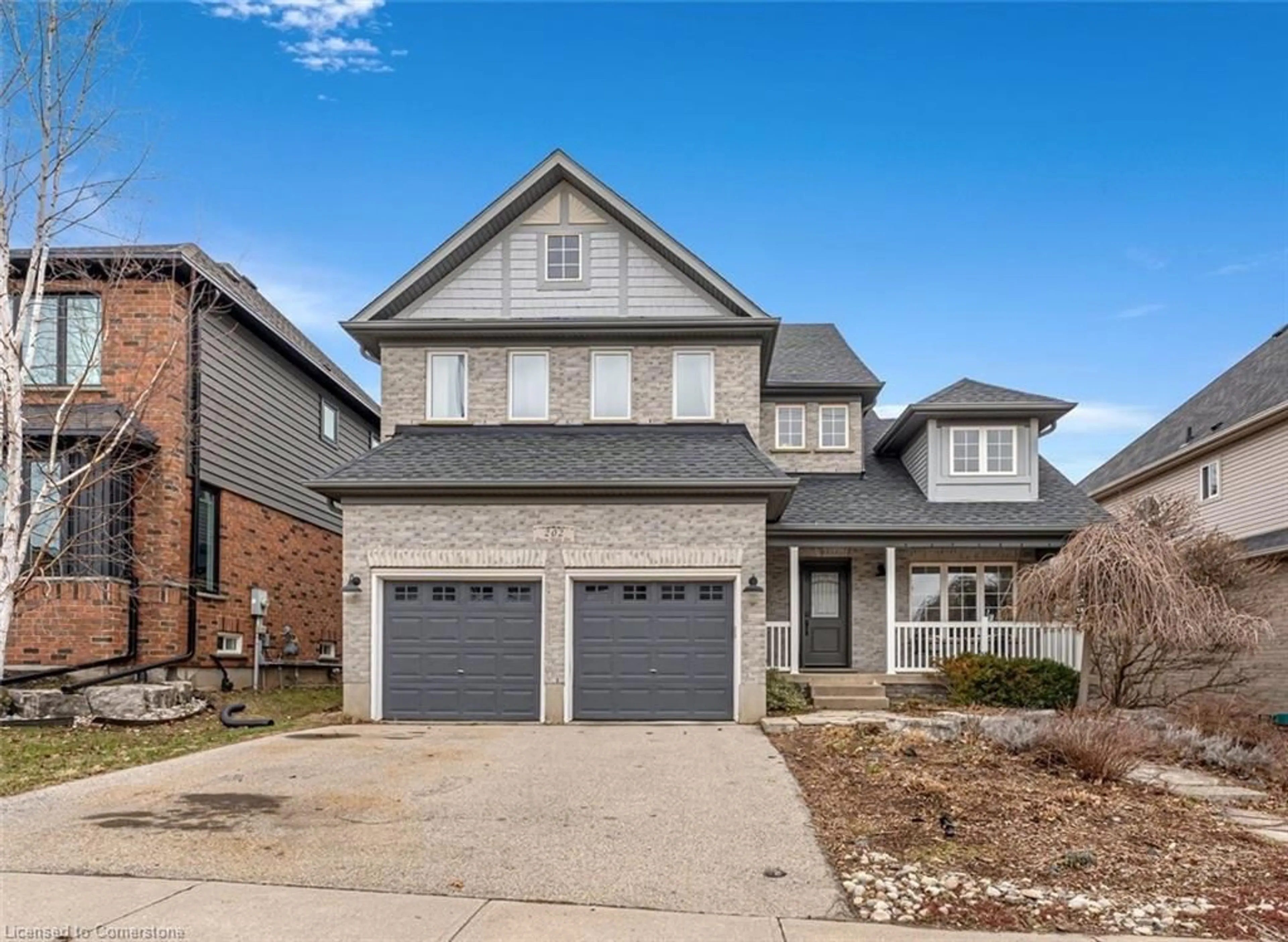 Home with brick exterior material, street for 202 Doon Mills Dr, Kitchener Ontario N2P 2R9