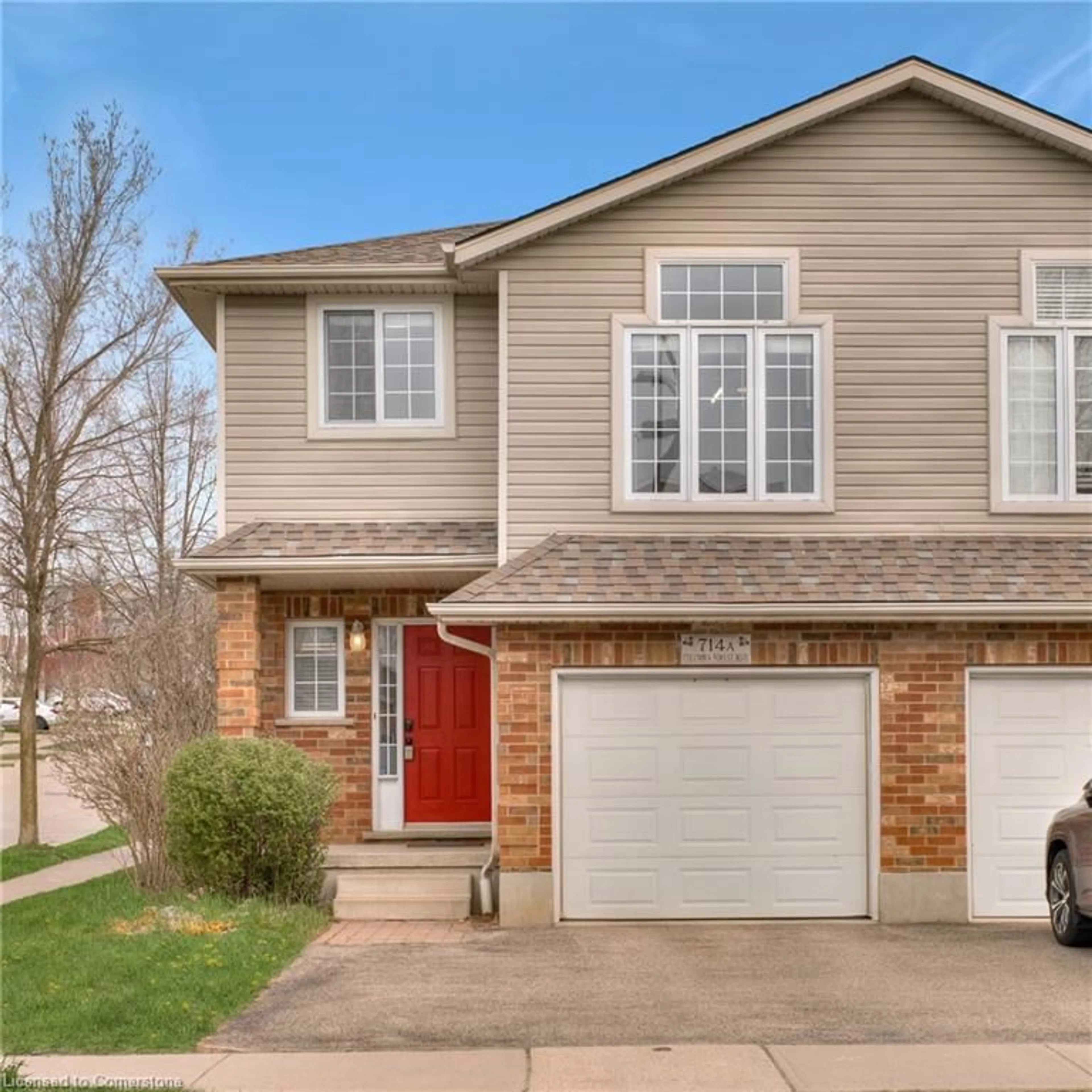 Home with brick exterior material, street for 714 Columbia Forest Blvd #A, Waterloo Ontario N2V 2M4