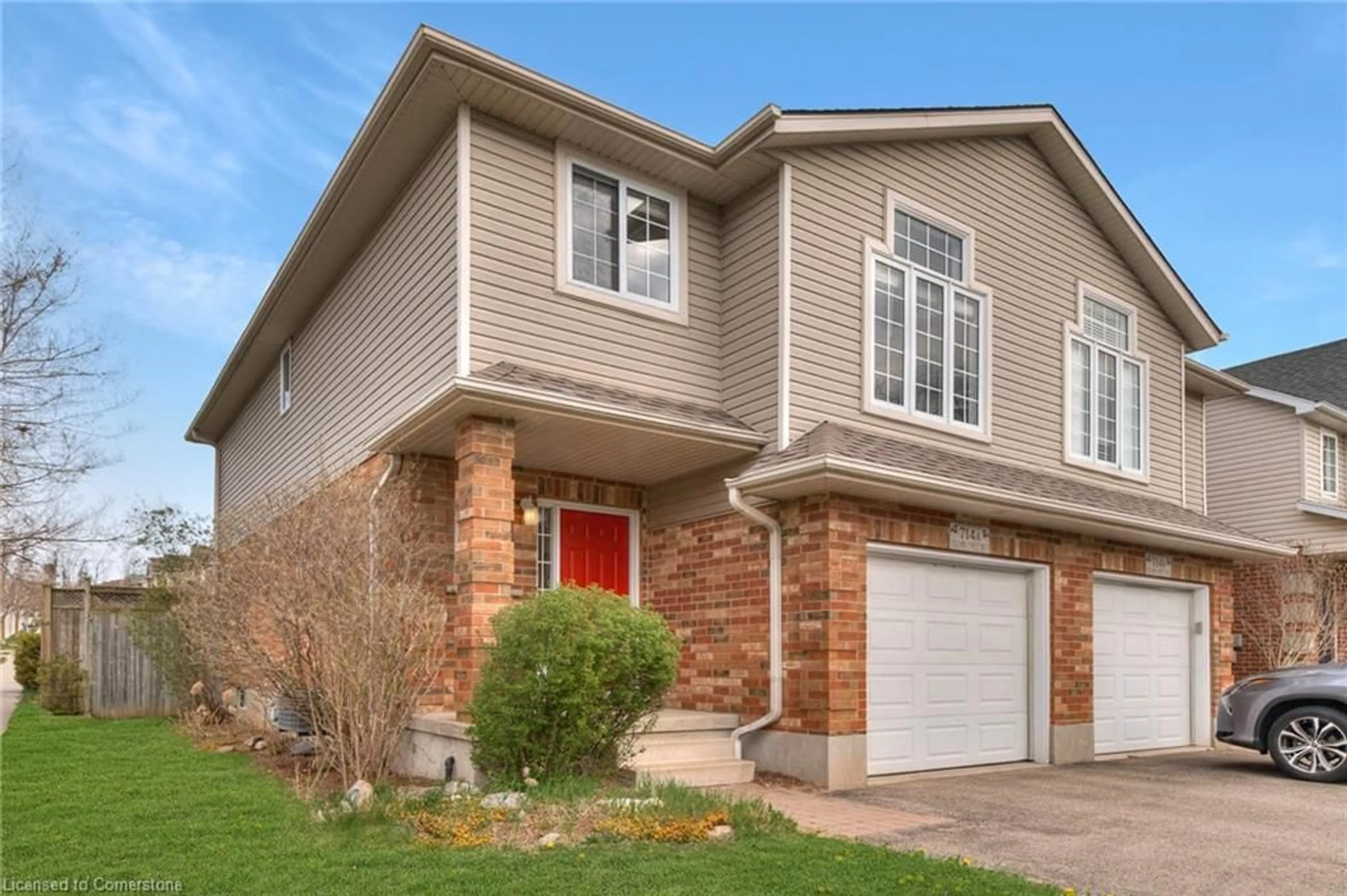 Home with brick exterior material, street for 714 Columbia Forest Blvd #A, Waterloo Ontario N2V 2M4