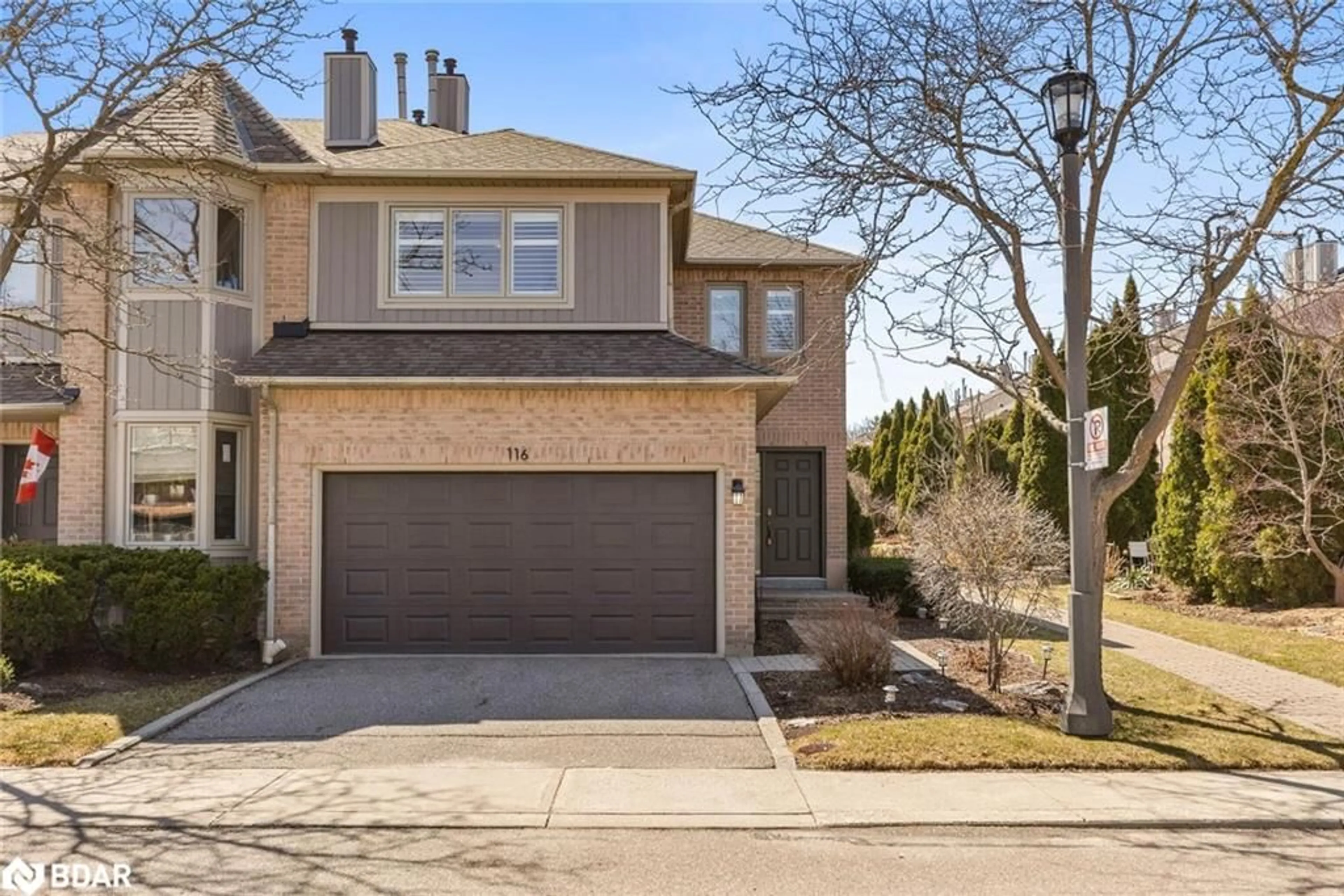 Home with brick exterior material, street for 5480 Glen Erin Dr #116, Mississauga Ontario L5M 5R3