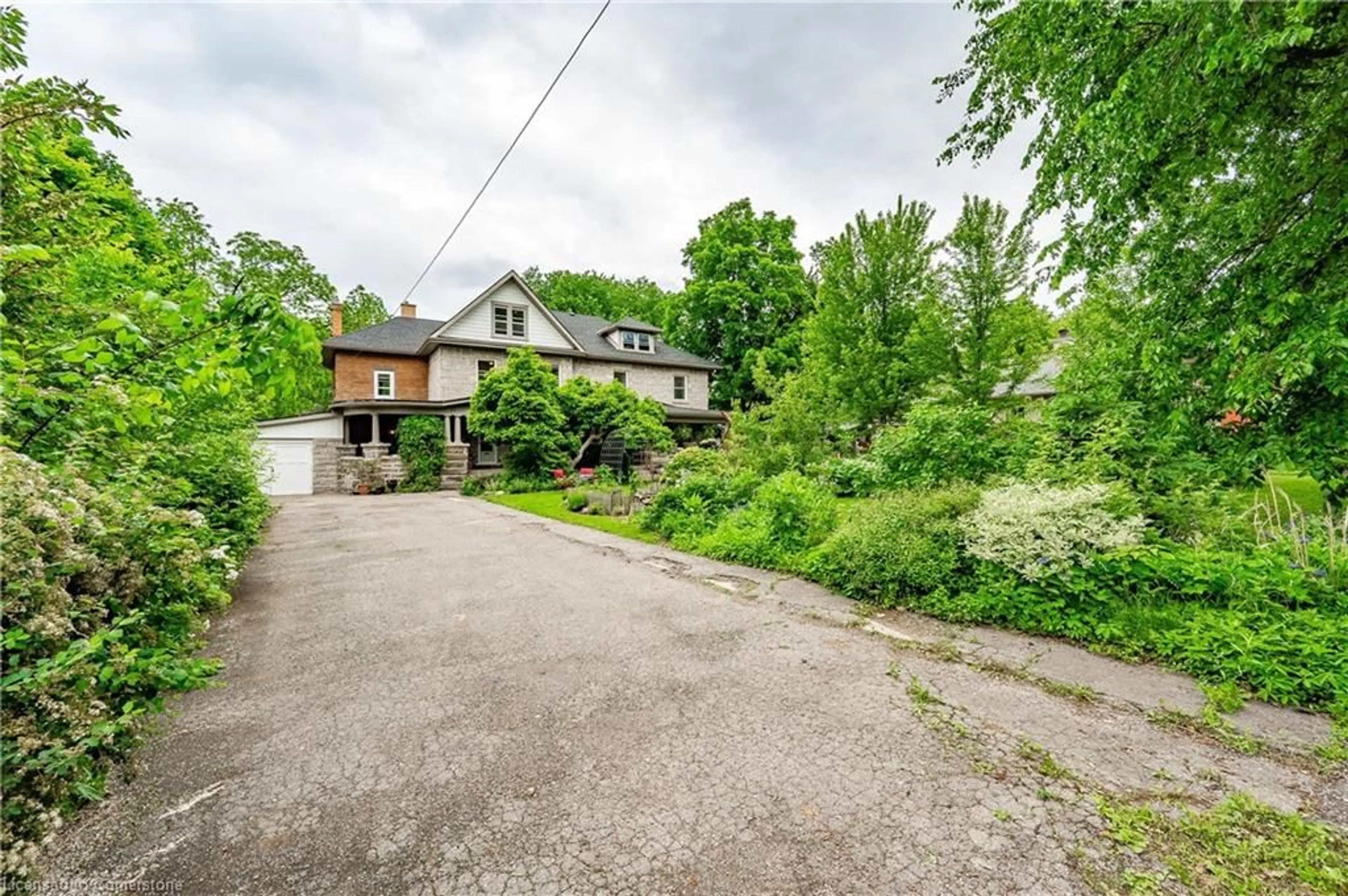 A pic from outside/outdoor area/front of a property/back of a property/a pic from drone, street for 35-37 Powell St, Guelph Ontario N1H 1V1