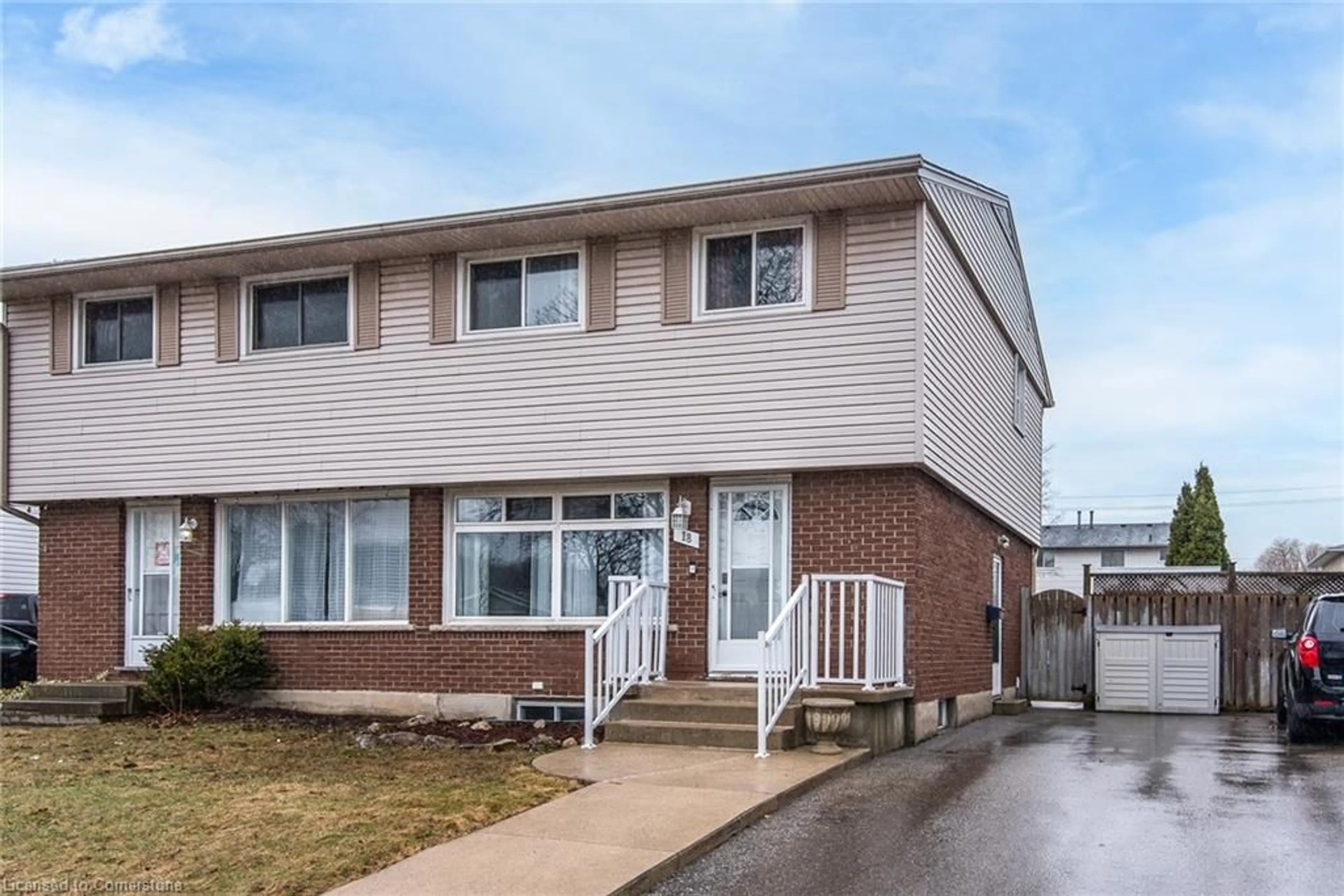 Home with vinyl exterior material, street for 18 Lucerne Dr, Kitchener Ontario N2E 1B3