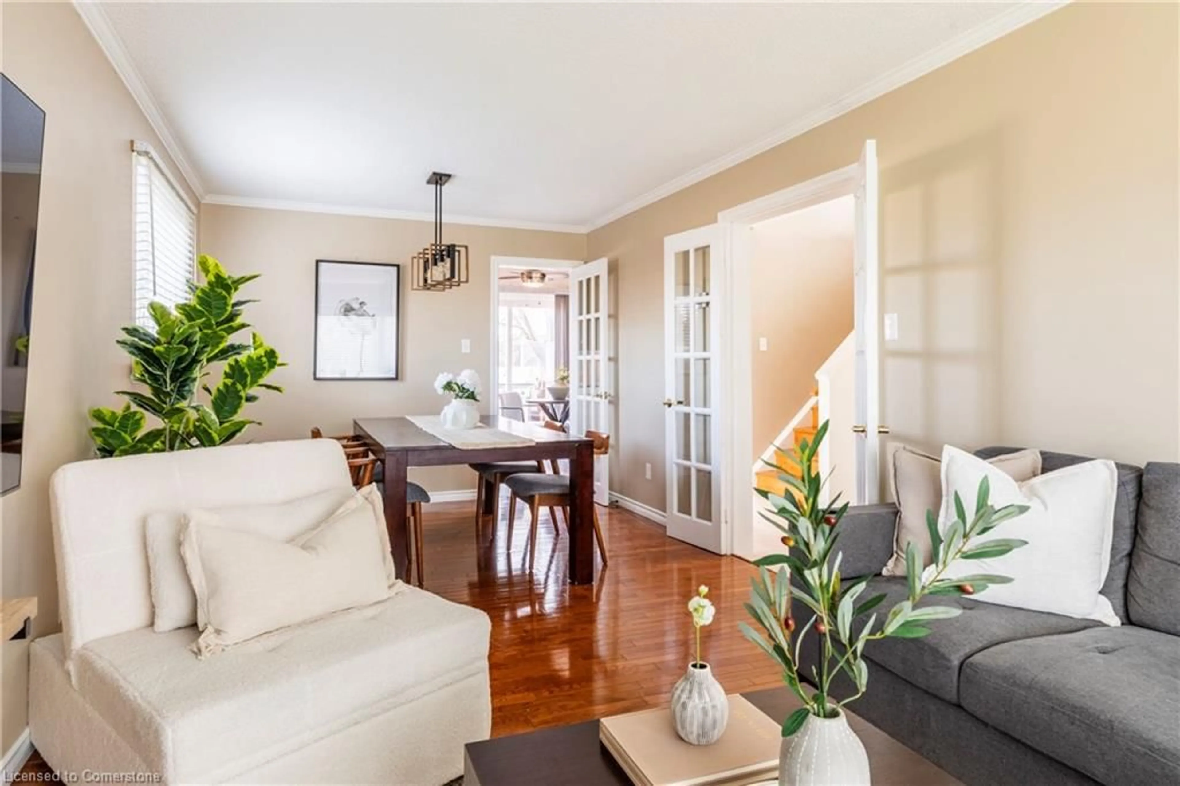 Living room with furniture, wood/laminate floor for 3261 Woodcroft Cres, Burlington Ontario L7M 3K8