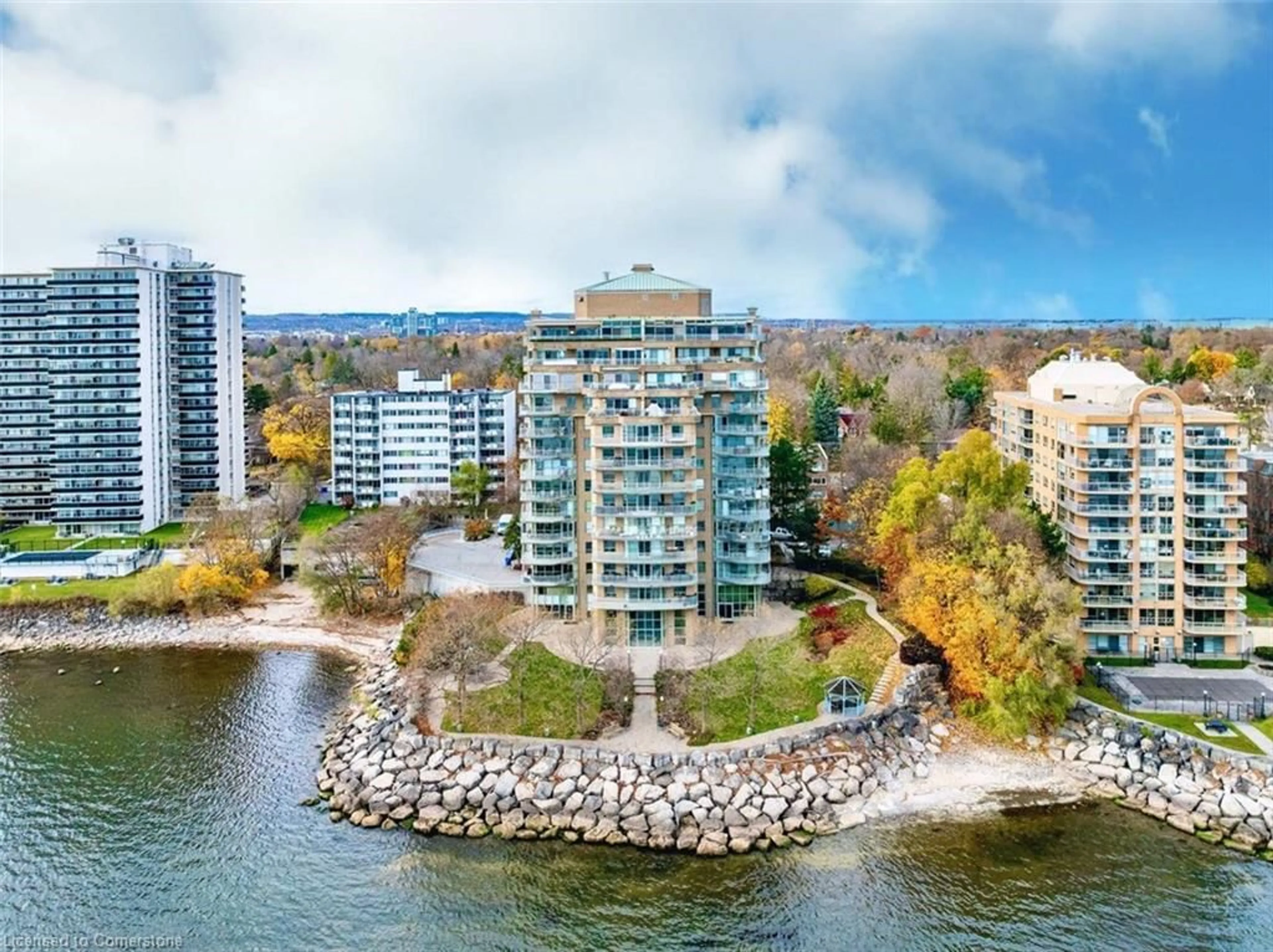 A pic from outside/outdoor area/front of a property/back of a property/a pic from drone, water/lake/river/ocean view for 2190 Lakeshore Rd #301, Burlington Ontario L7R 4K1