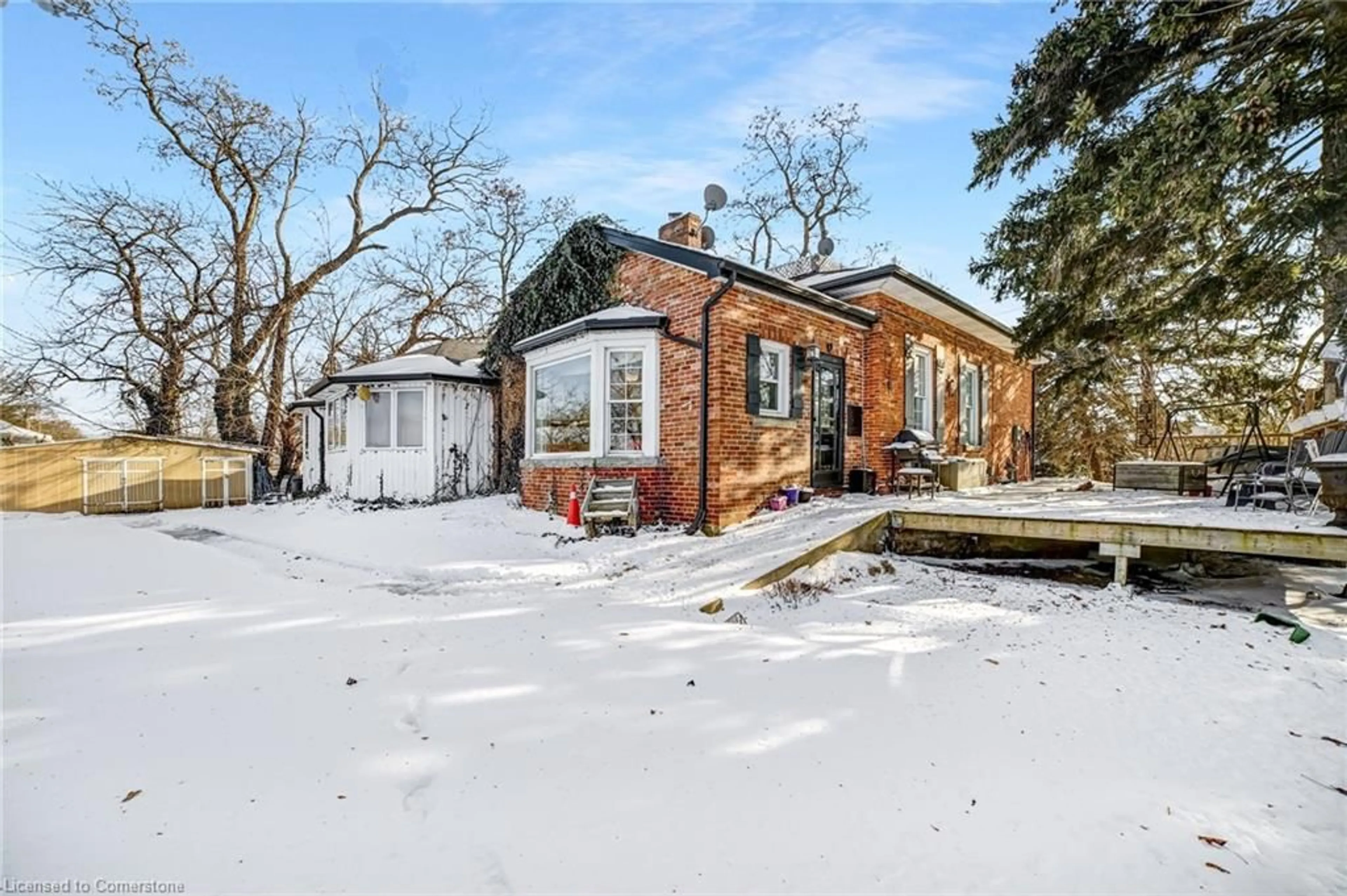 Home with brick exterior material, unknown for 42 East 11th St, Hamilton Ontario L9A 3T2