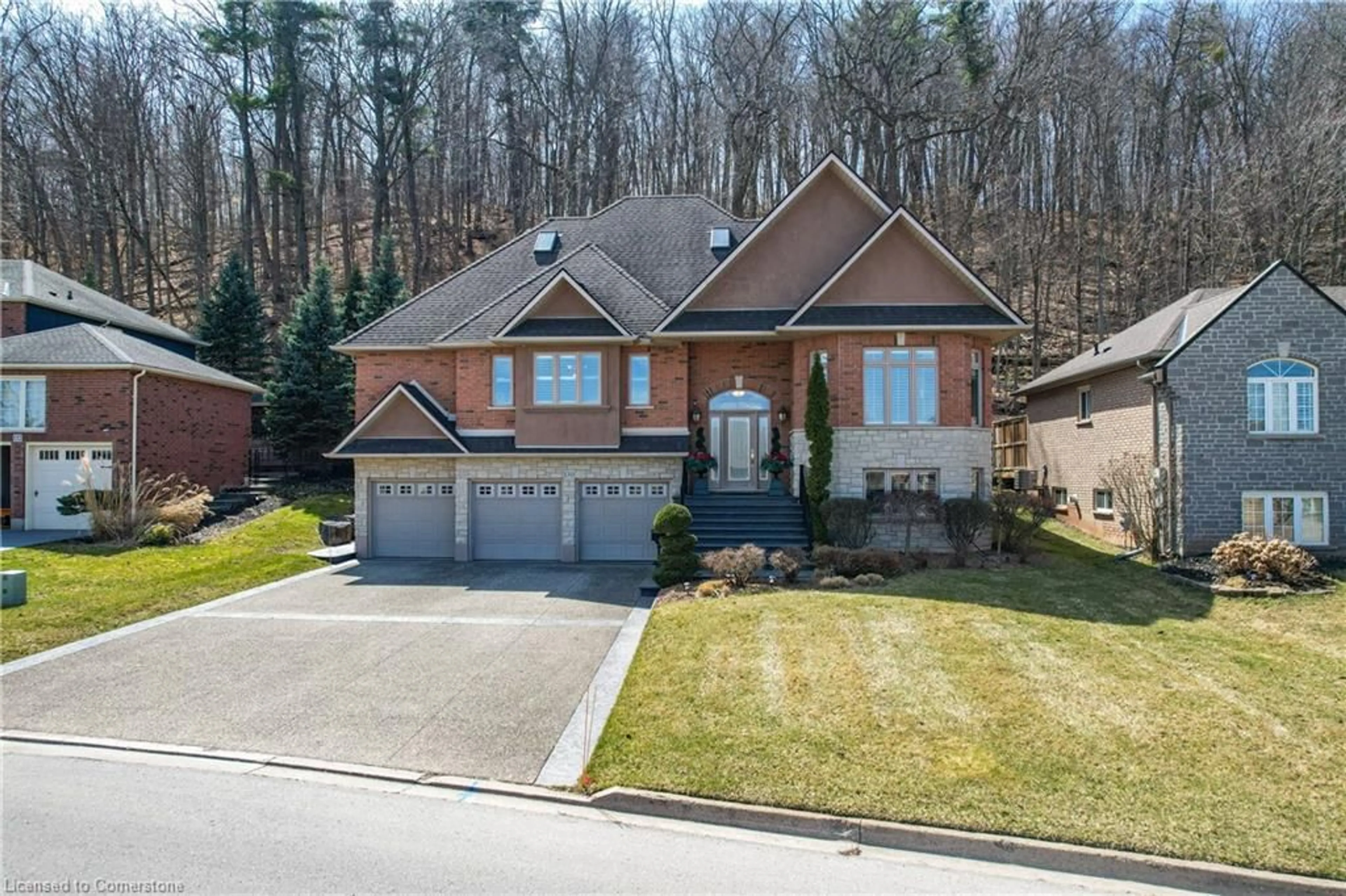 Home with brick exterior material, street for 130 Dorchester Dr, Grimsby Ontario L3M 1A8