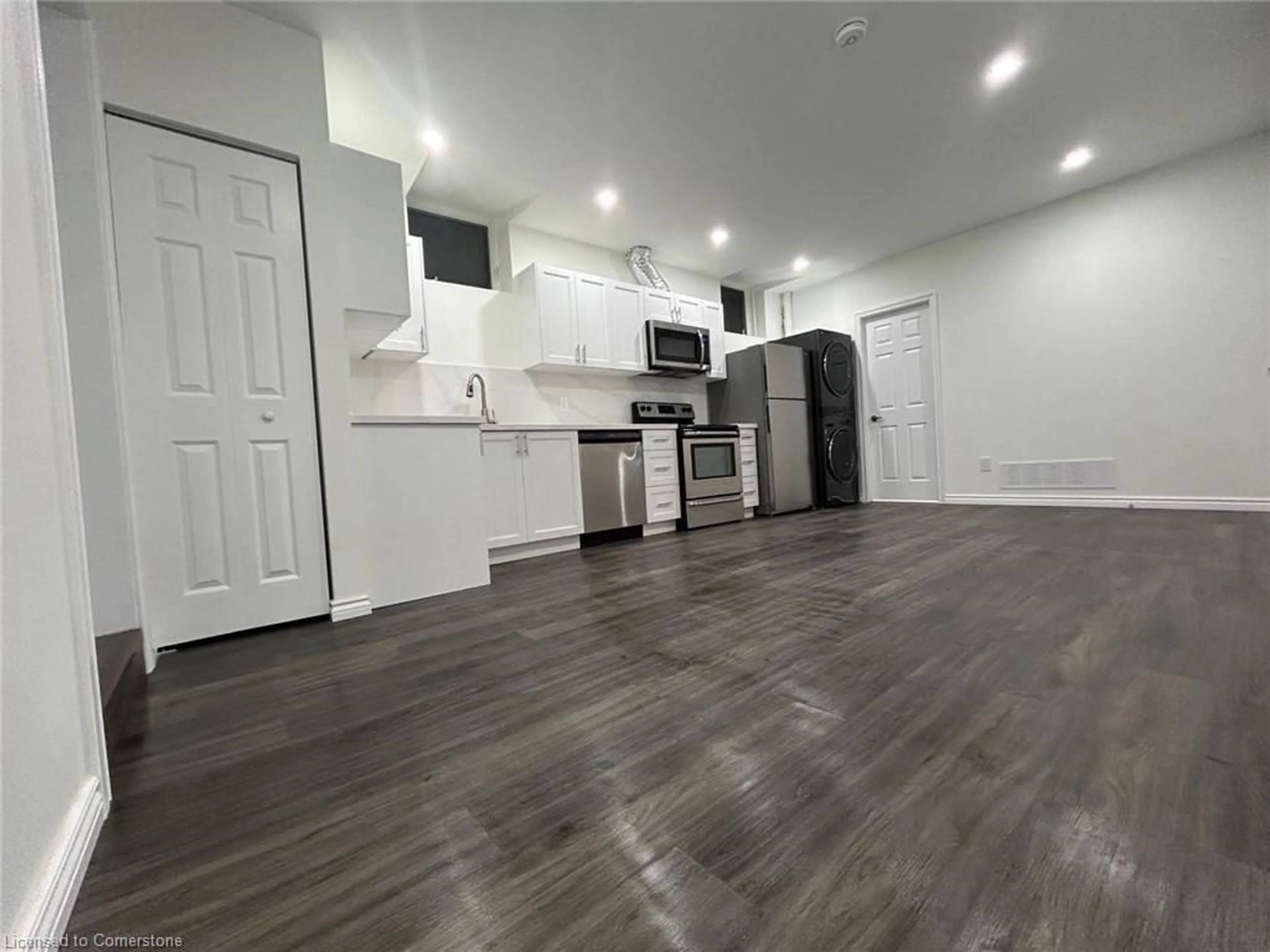 Open concept kitchen, wood/laminate floor for 31 Sofitel Dr, Kitchener Ontario N2R 0J3