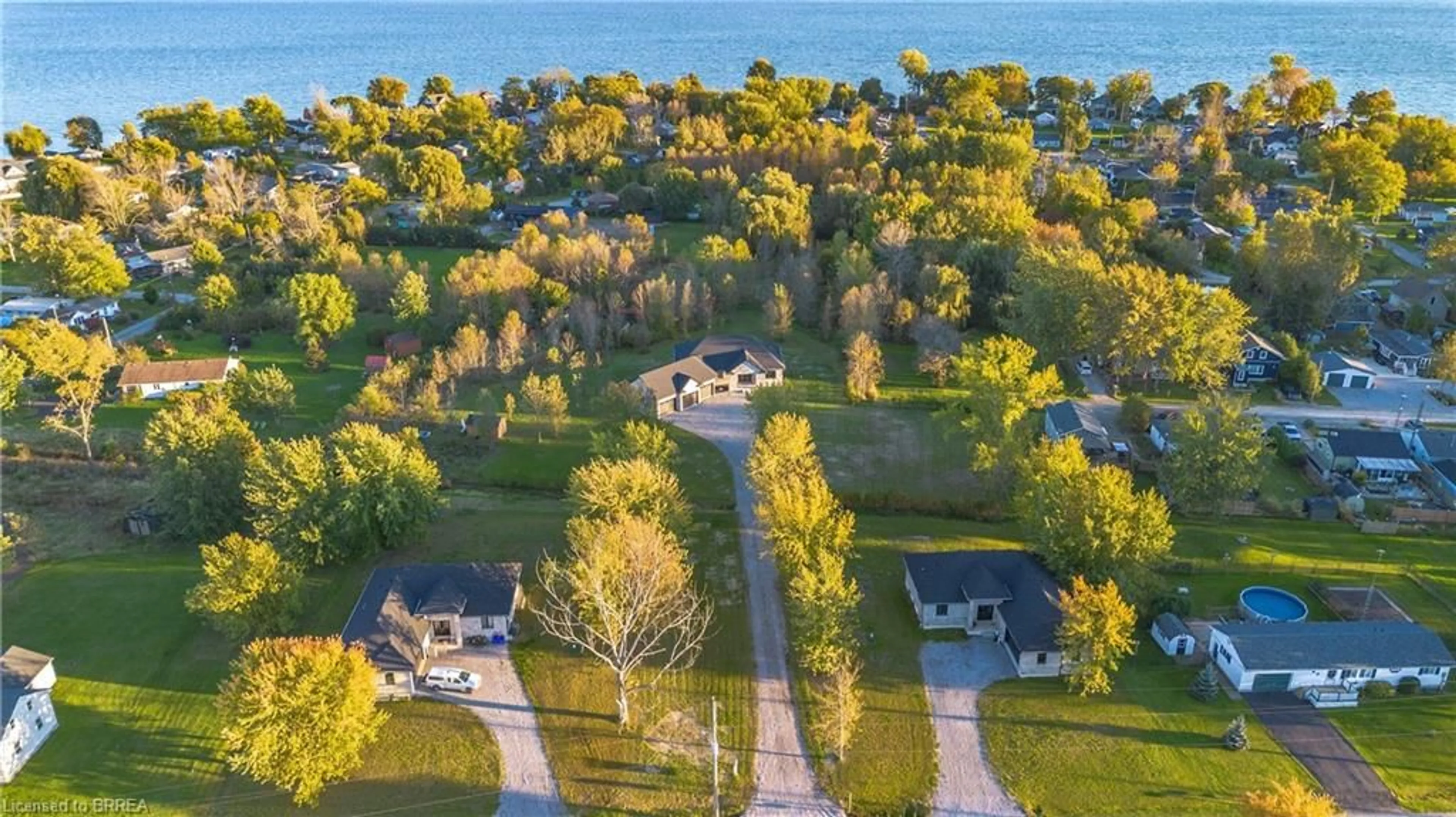 A pic from outside/outdoor area/front of a property/back of a property/a pic from drone, water/lake/river/ocean view for 790 South Coast Dr, Peacock Point Ontario N0A 1P0