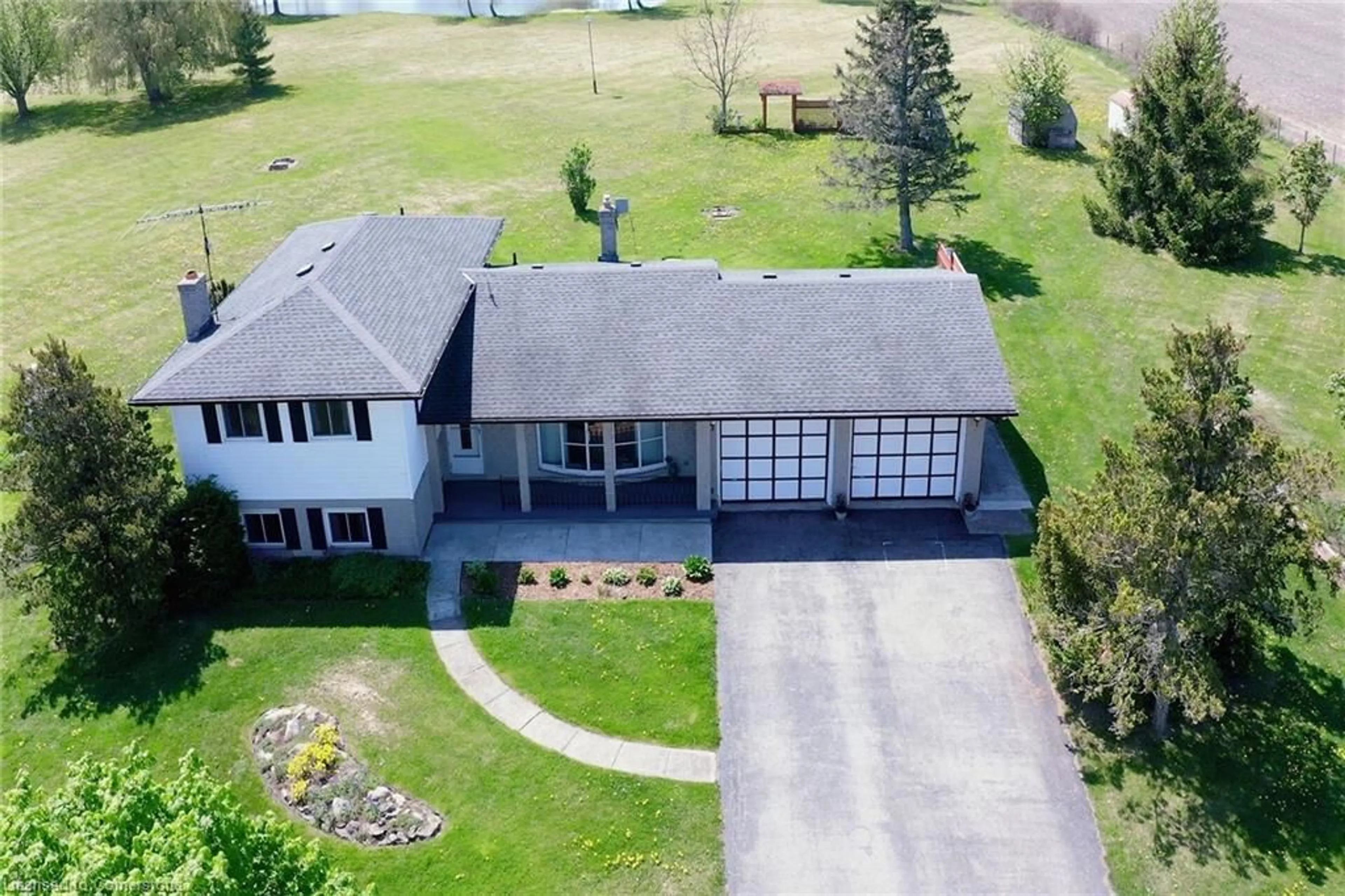 A pic from outside/outdoor area/front of a property/back of a property/a pic from drone, unknown for 11241 Hwy 3 Hwy, Port Colborne Ontario L3K 5V4