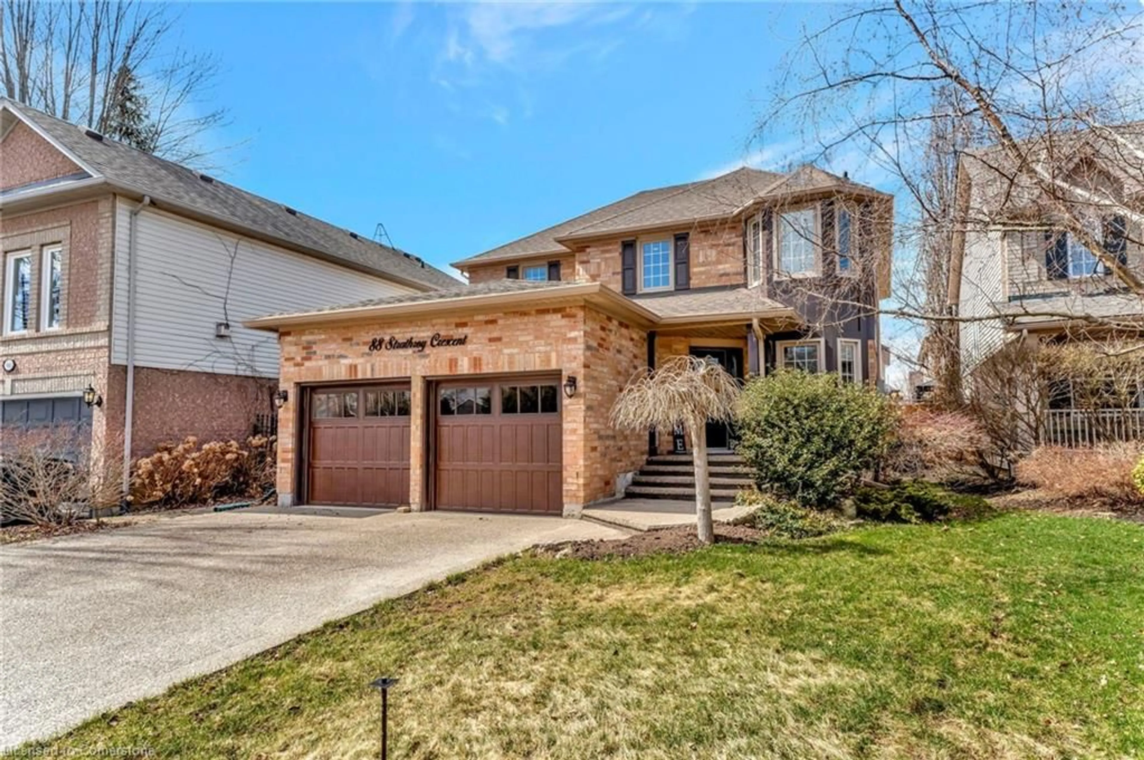 Home with brick exterior material, street for 88 Strathroy Cres, Waterdown Ontario L8B 0N5