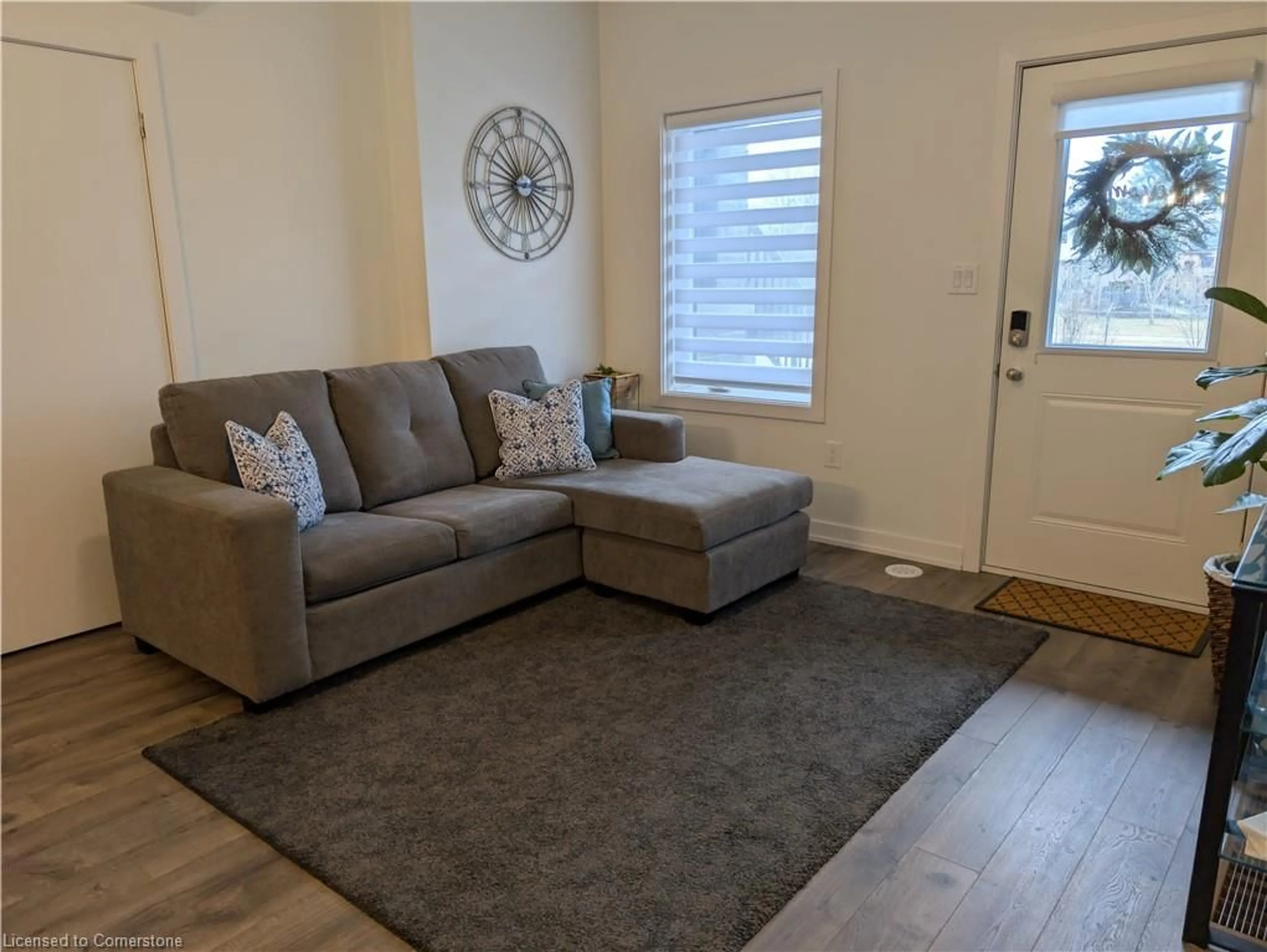Living room with furniture, unknown for 590 North Service Rd #14, Hamilton Ontario L8E 0K5