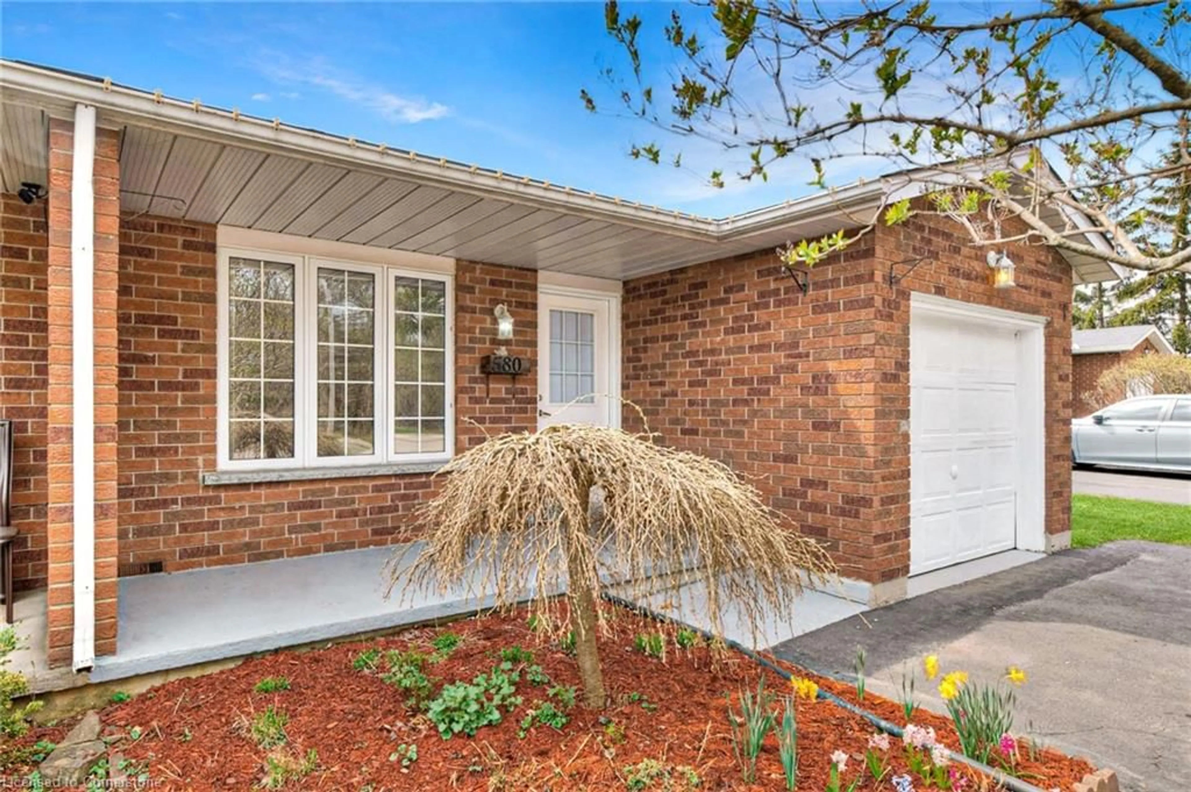 Home with brick exterior material, street for 580 Old Huron Pl, Kitchener Ontario N2R 1L8