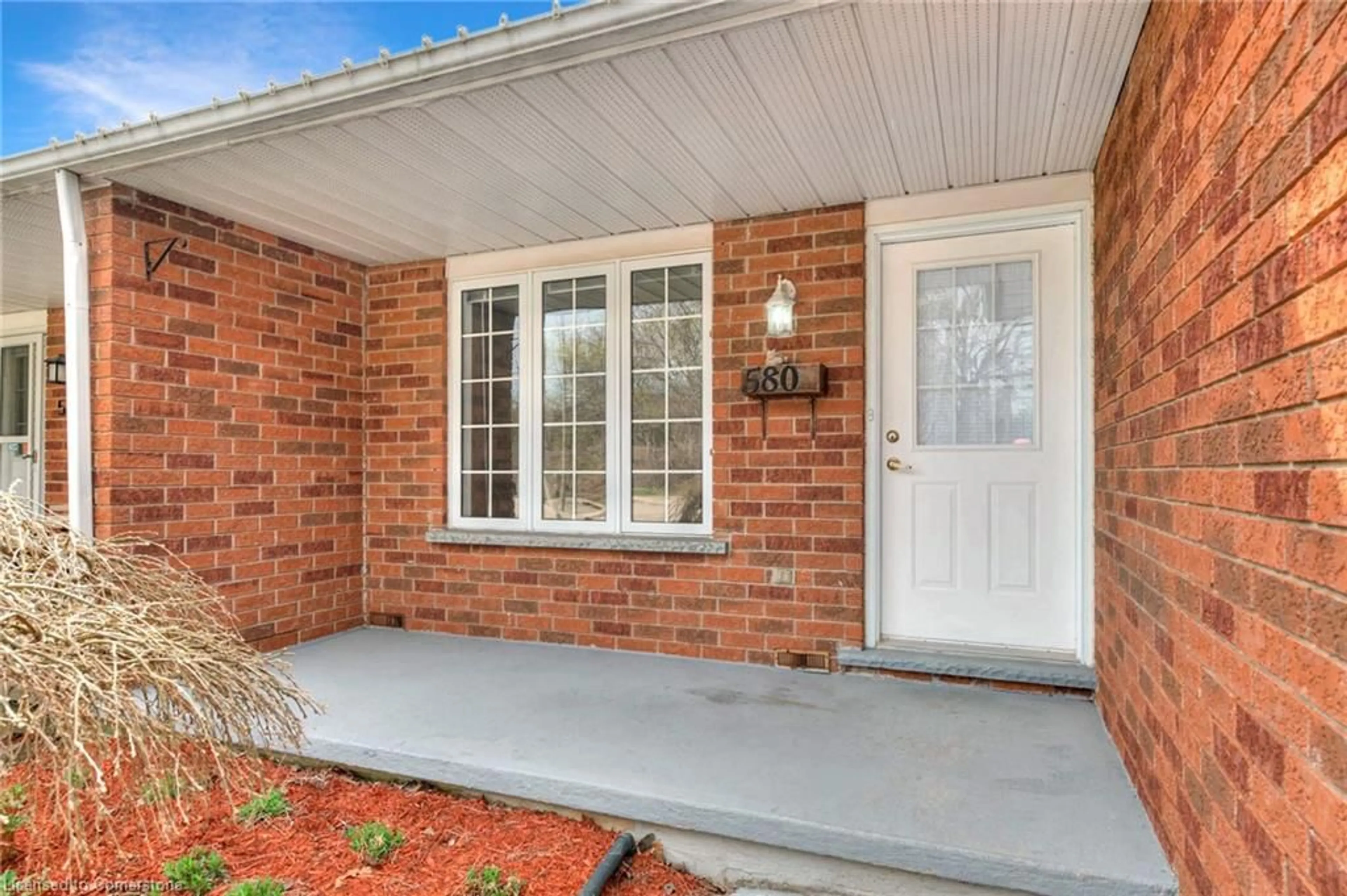 Home with brick exterior material, street for 580 Old Huron Pl, Kitchener Ontario N2R 1L8