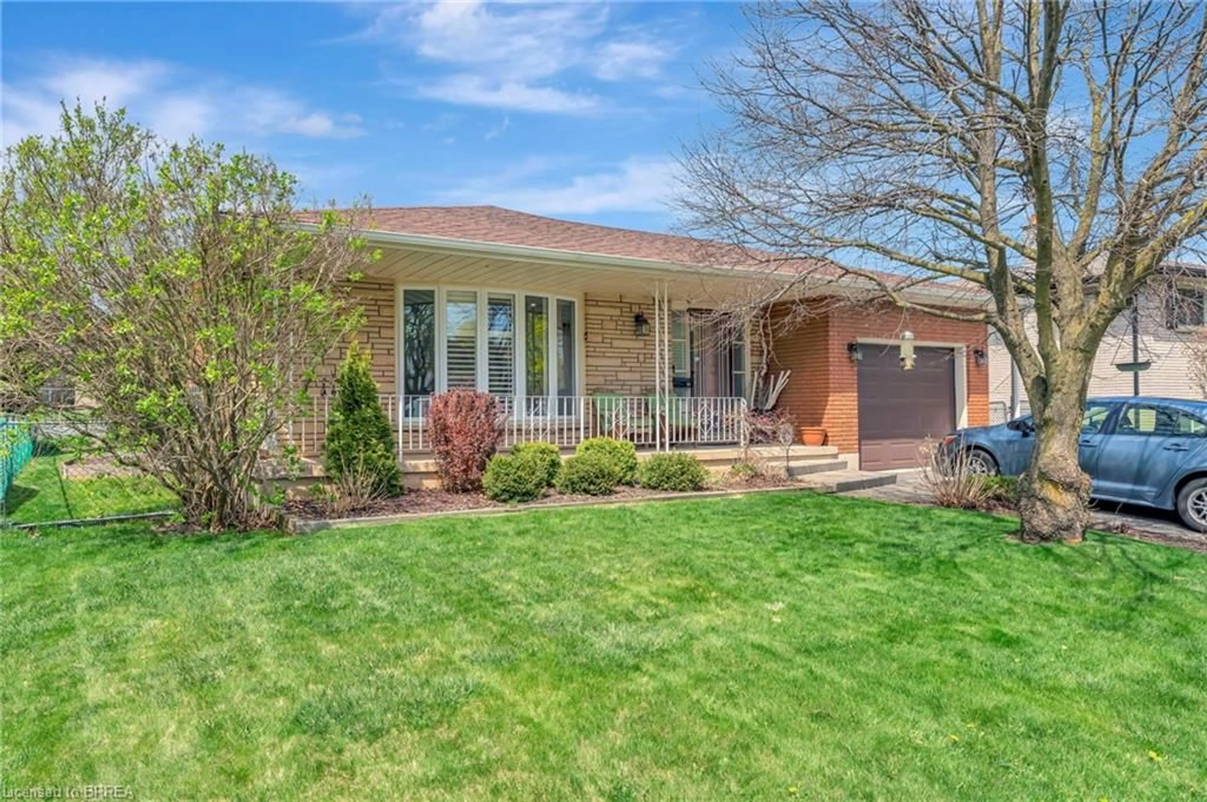 Home with brick exterior material, street for 64 Farringford Dr, Brantford Ontario N3R 6K8