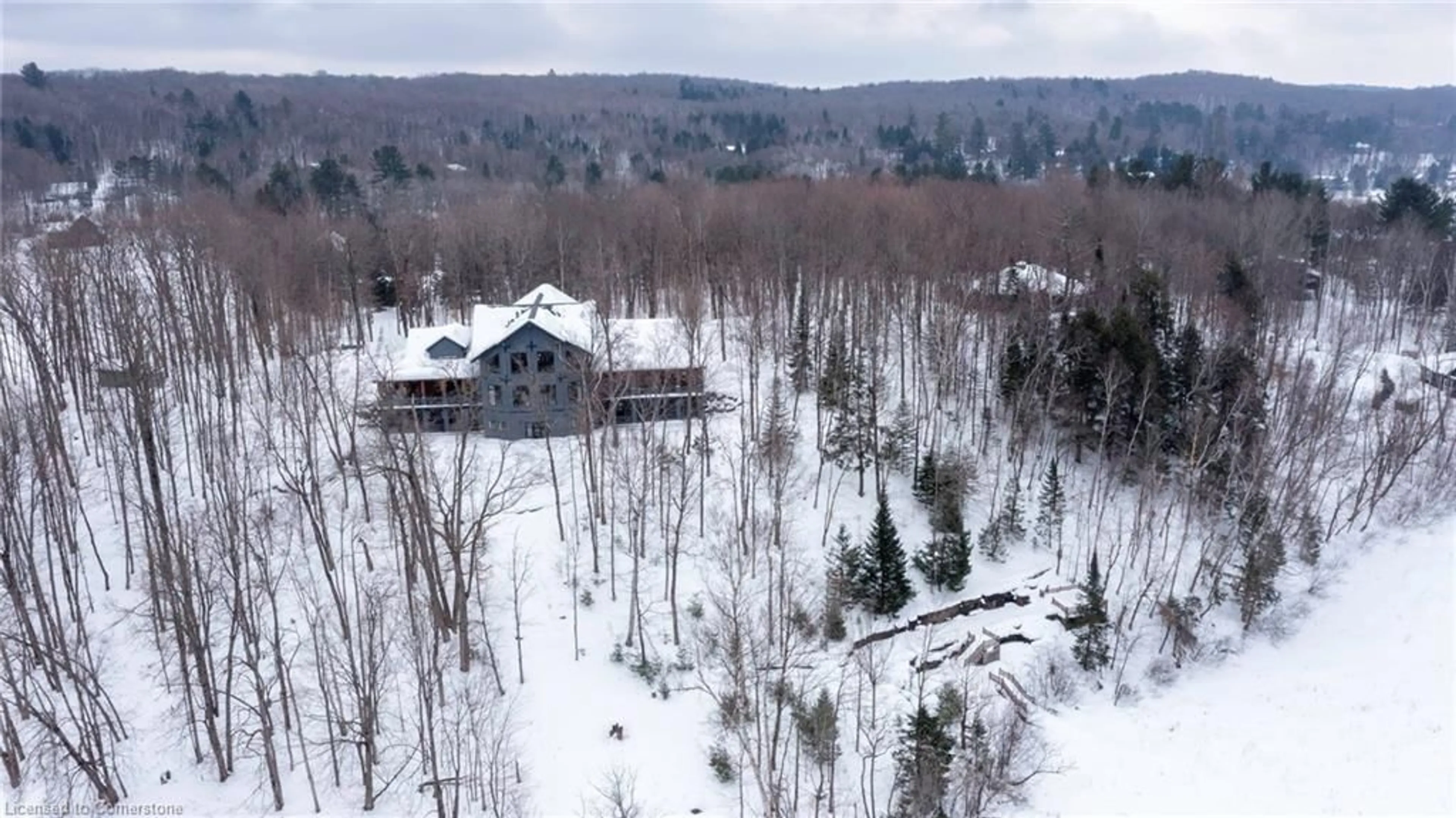 A pic from outside/outdoor area/front of a property/back of a property/a pic from drone, mountain view for 84 Swallowdale Rd, Huntsville Ontario P1H 0A5
